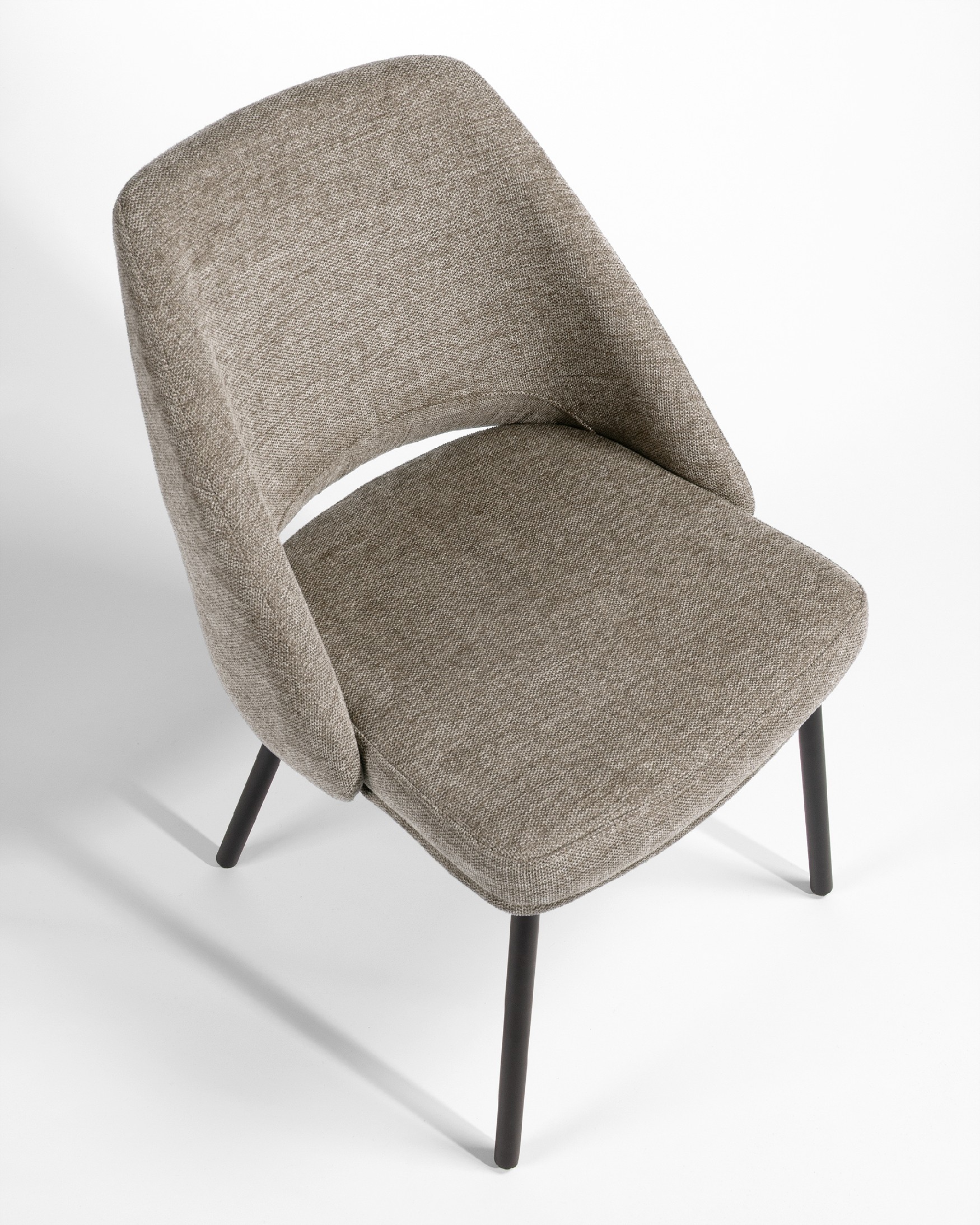 Beirut chair with brown upholstery and black metal legs