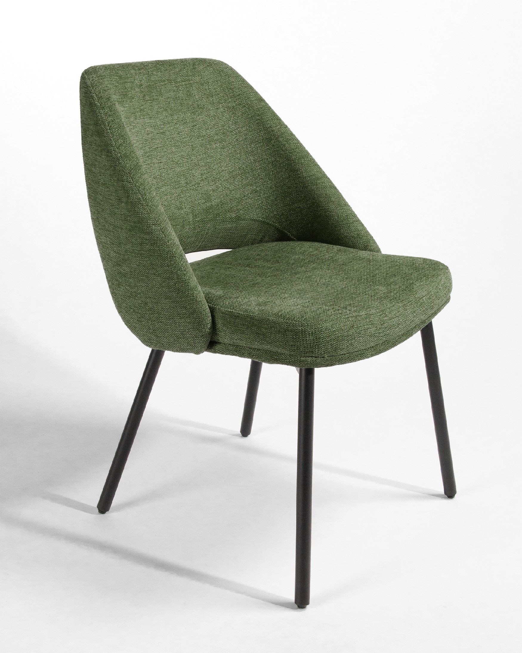 Beirut chair with green upholstery and black metal legs