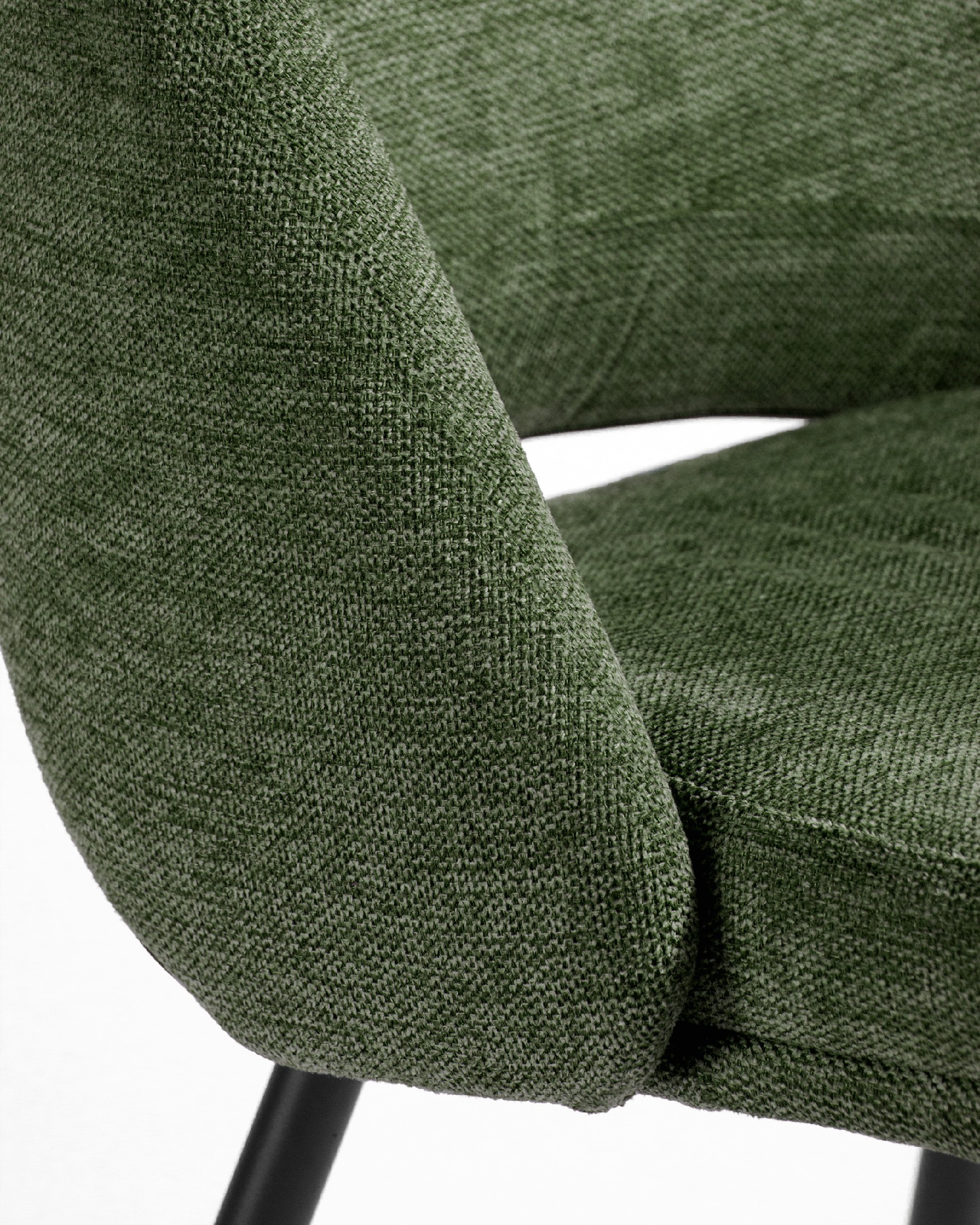 Beirut chair with green upholstery and black metal legs
