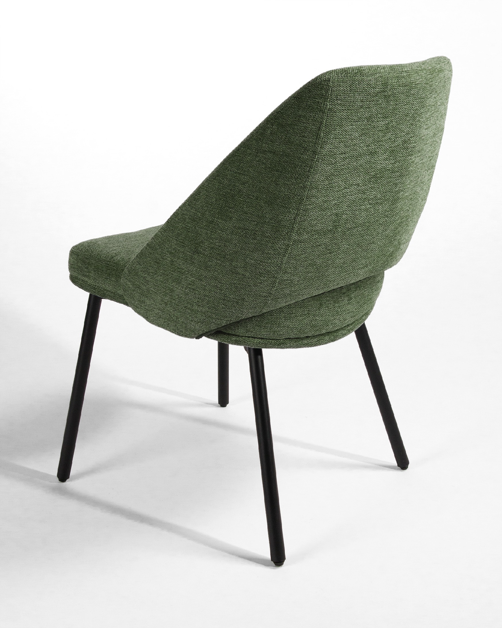 Beirut chair with green upholstery and black metal legs