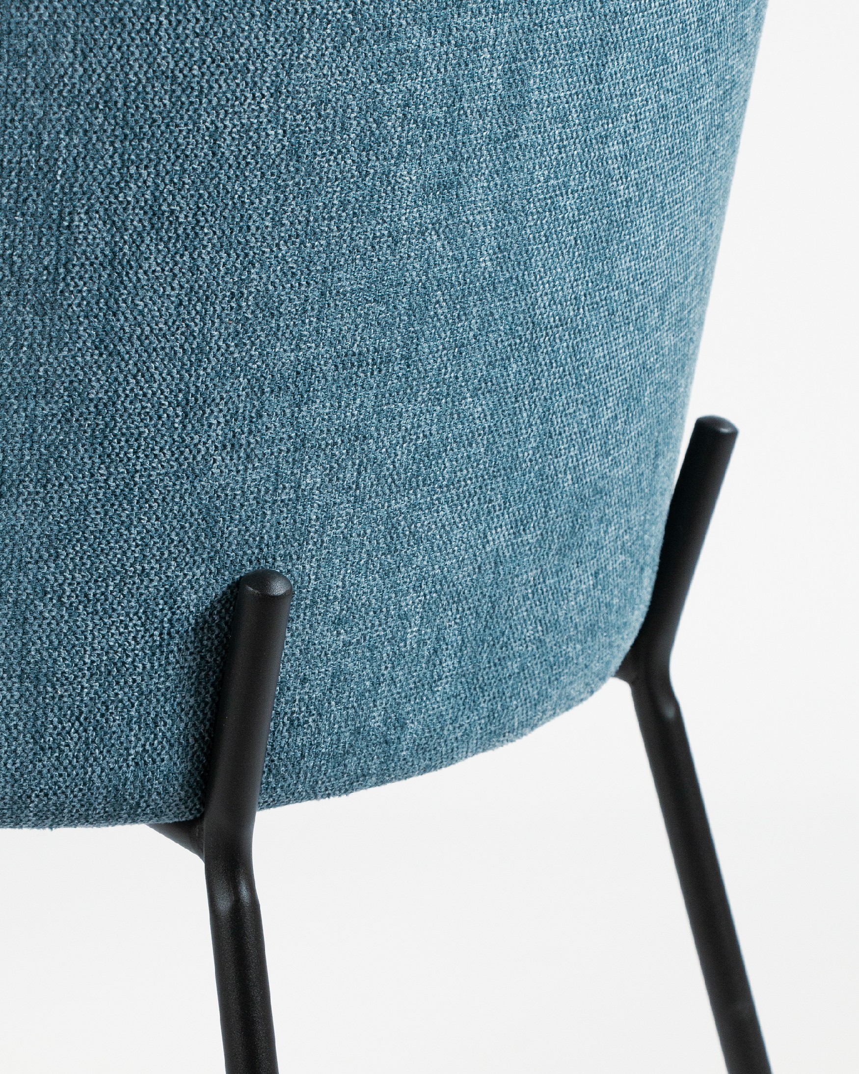 Bergen chair with blue upholstery and black metal legs
