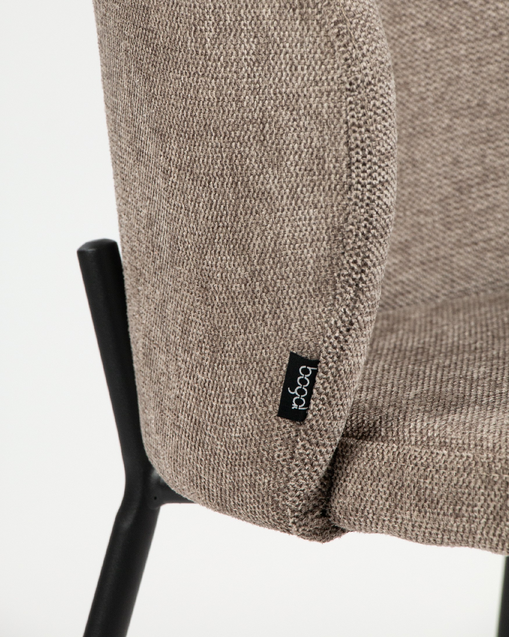 Bergen chair with brown upholstery and black metal legs