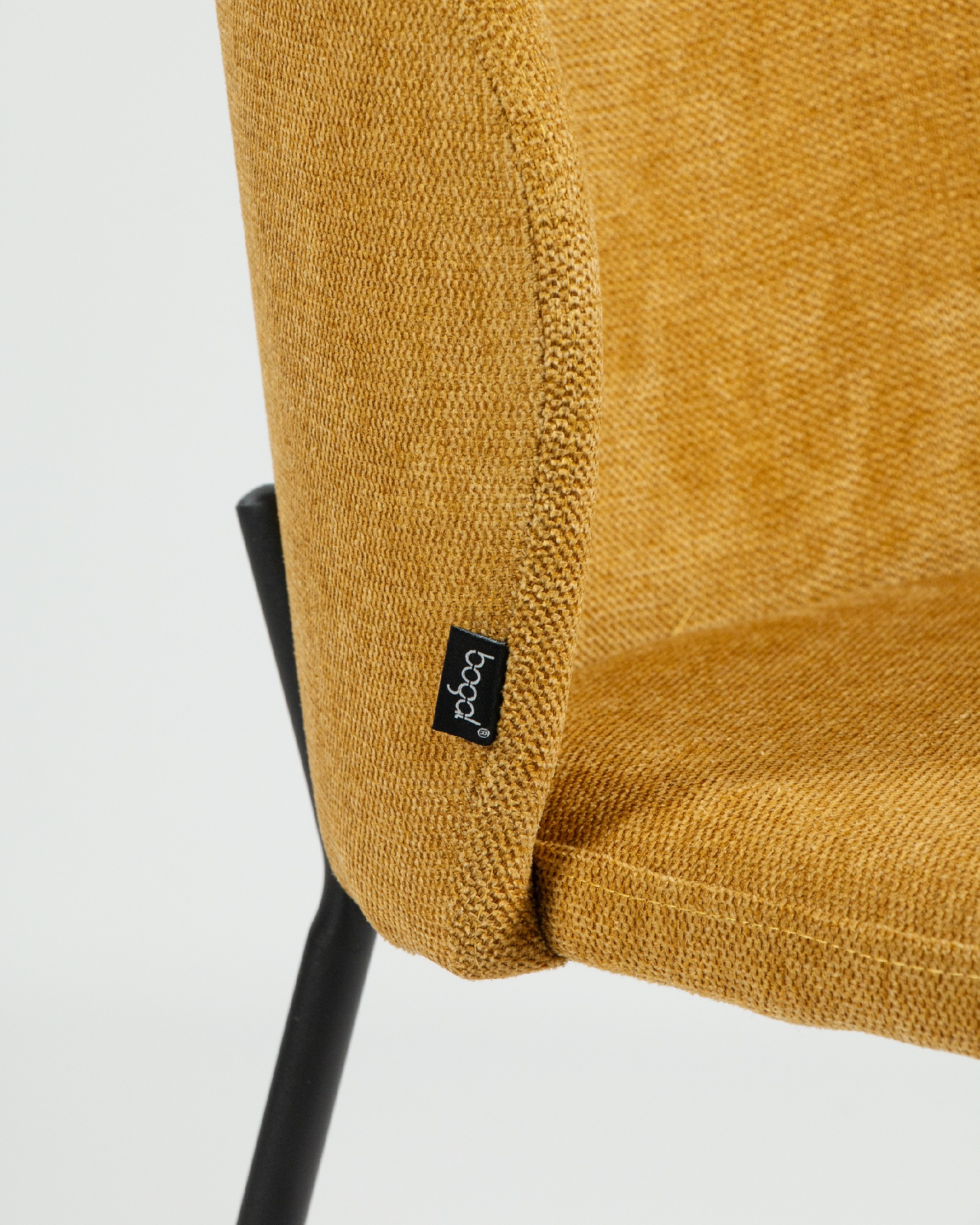 Bergen chair with mustard upholstery and black metal legs
