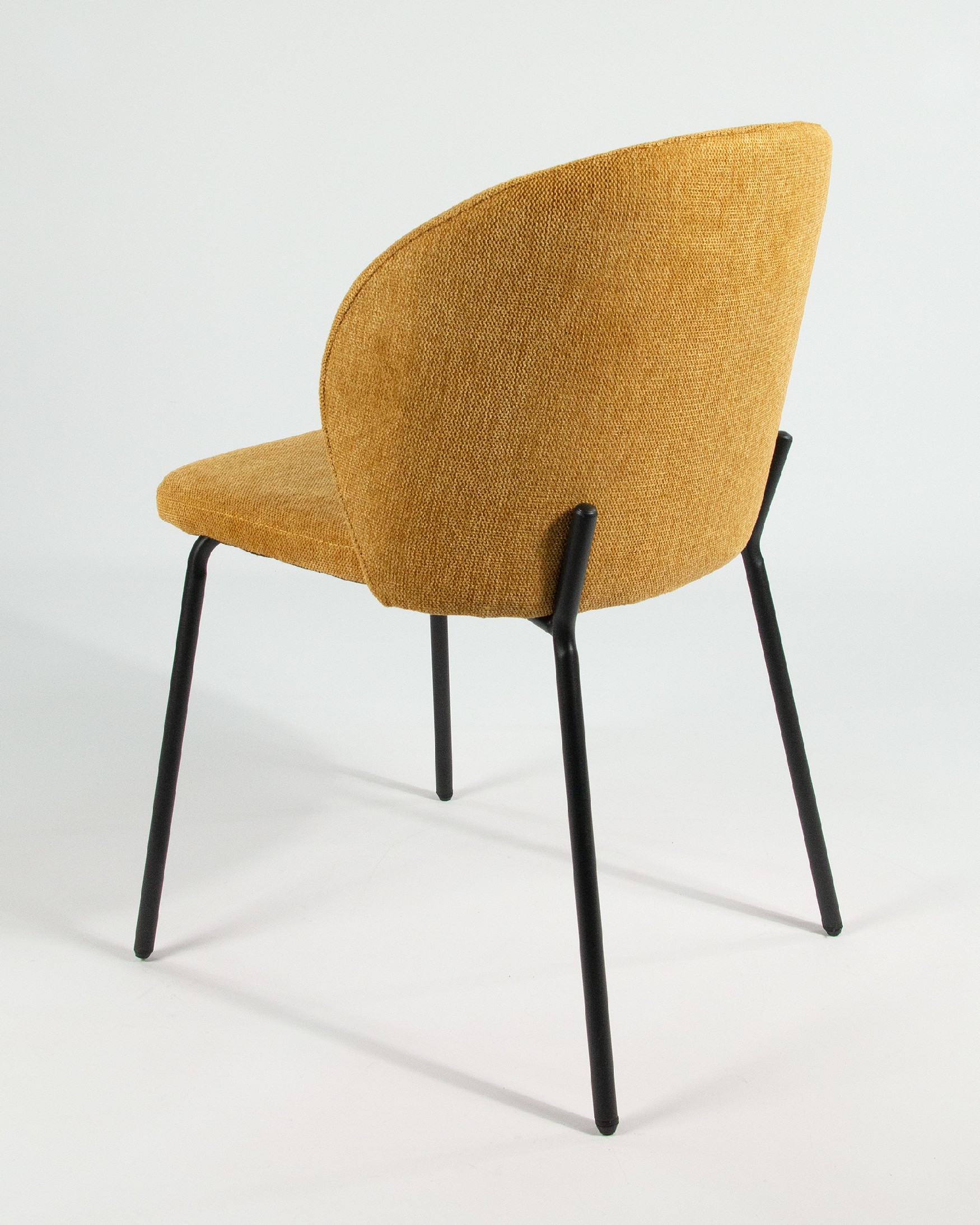 Bergen chair with mustard upholstery and black metal legs