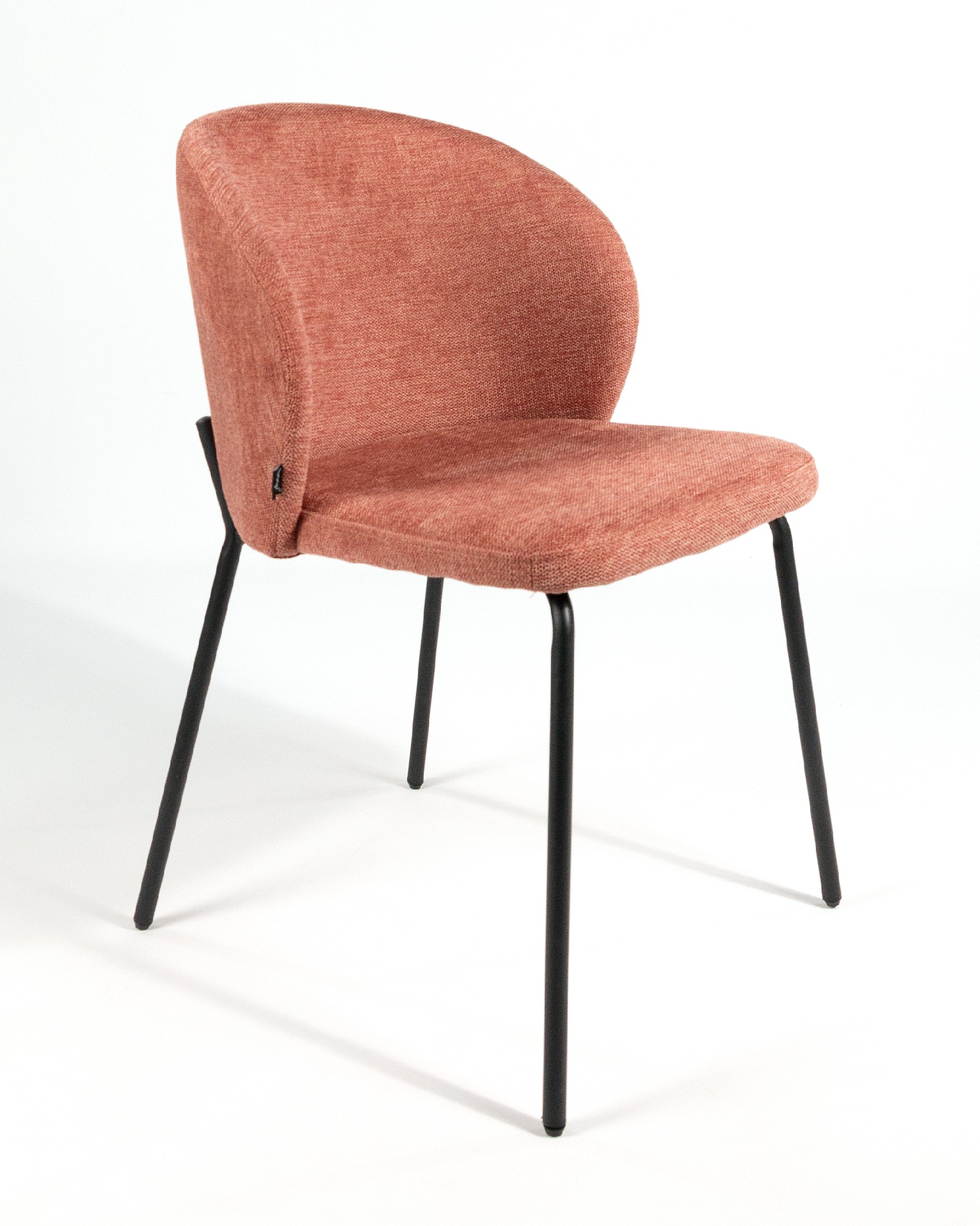 Bergen chair with salmon upholstery and black metal legs