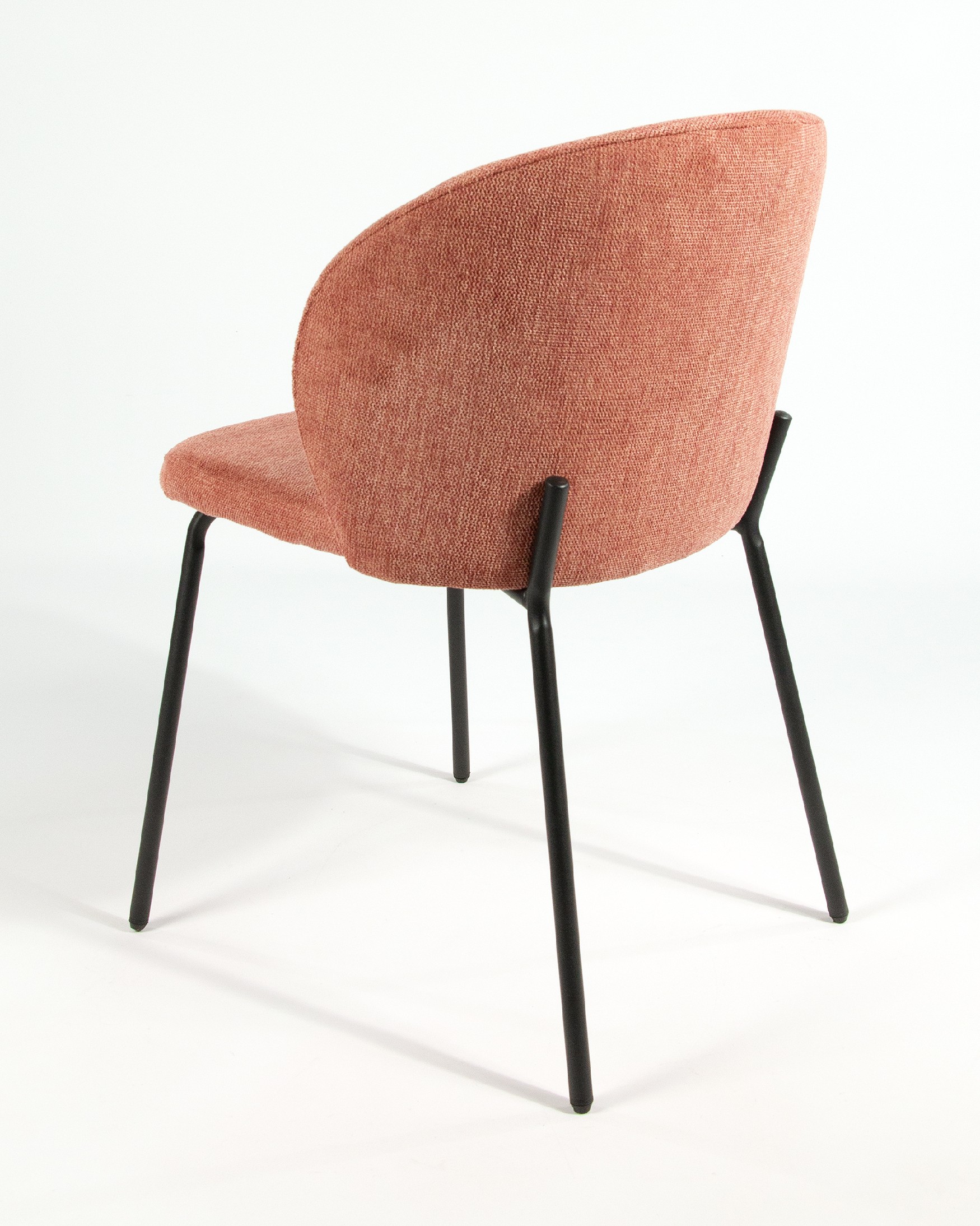 Bergen chair with salmon upholstery and black metal legs