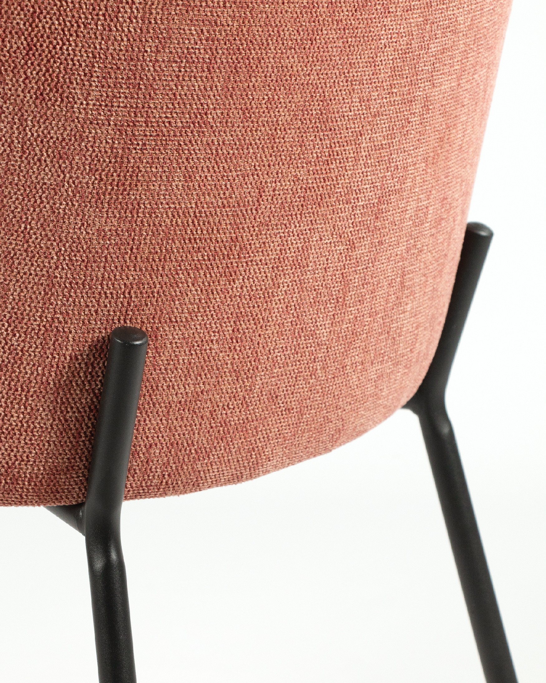 Bergen chair with salmon upholstery and black metal legs
