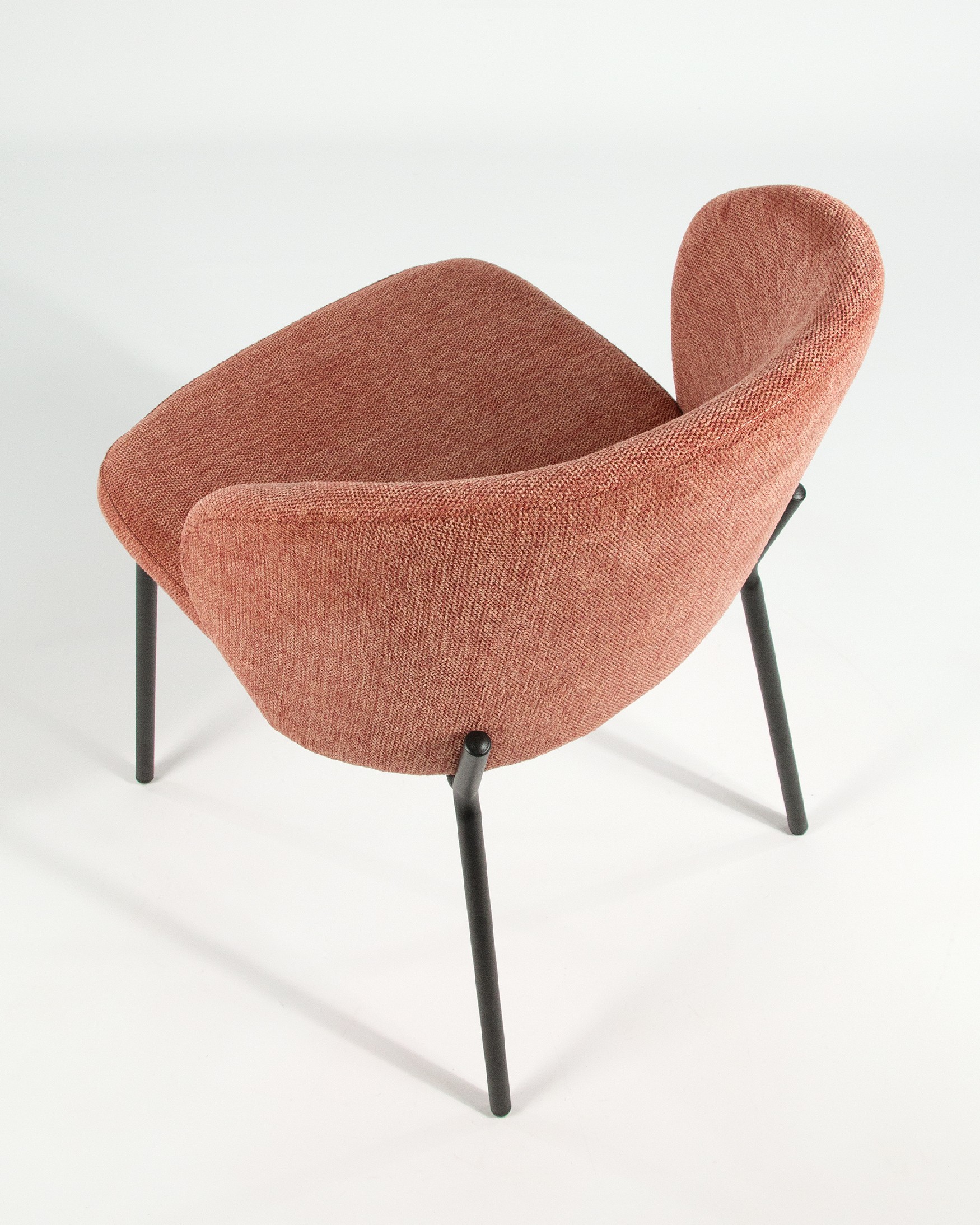 Bergen chair with salmon upholstery and black metal legs