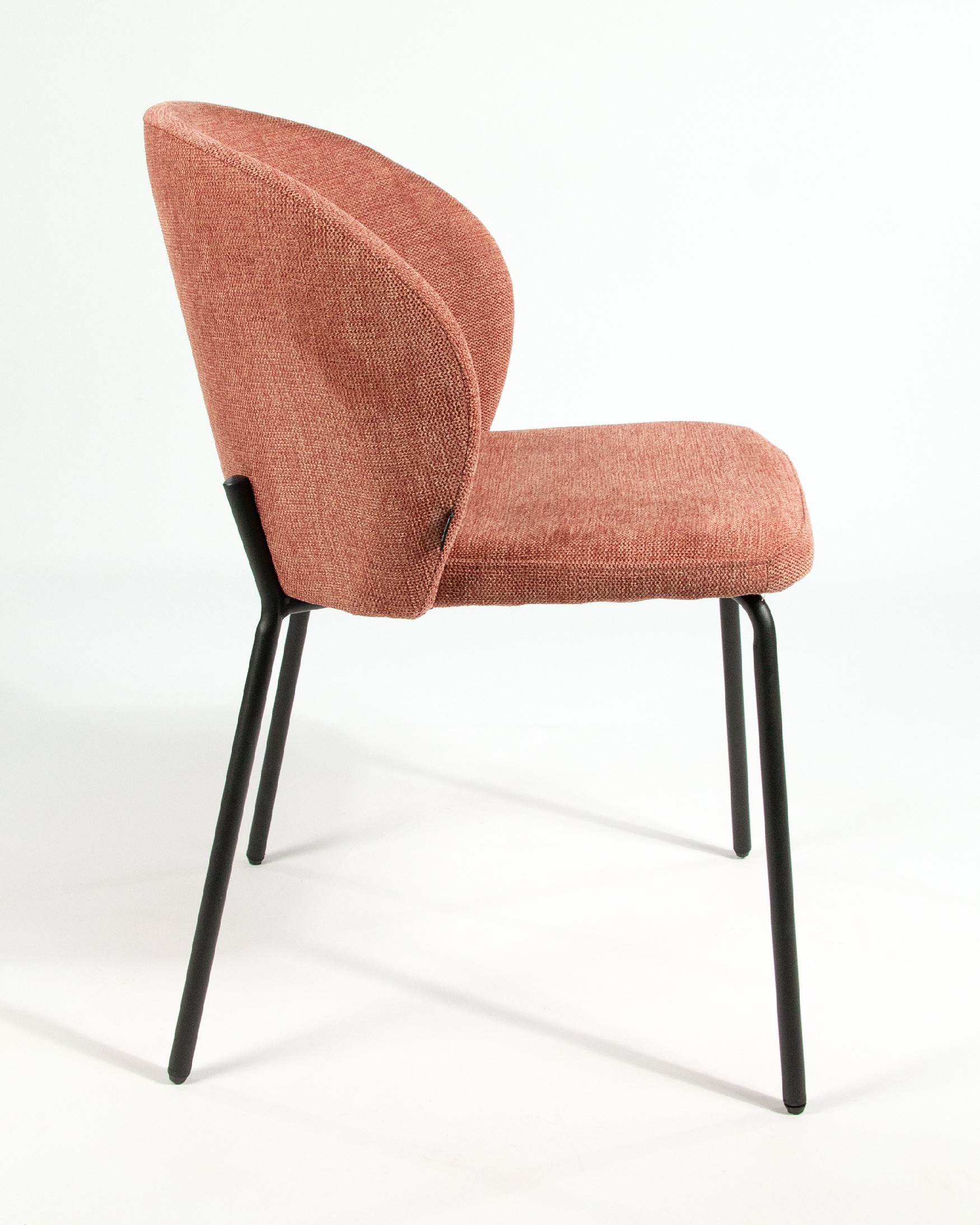 Bergen chair with salmon upholstery and black metal legs
