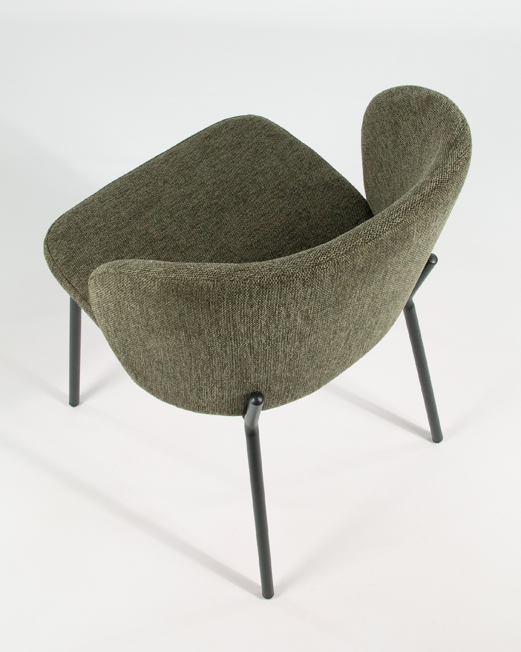Silla Bergen con tapizado verde y patas metálicas negras