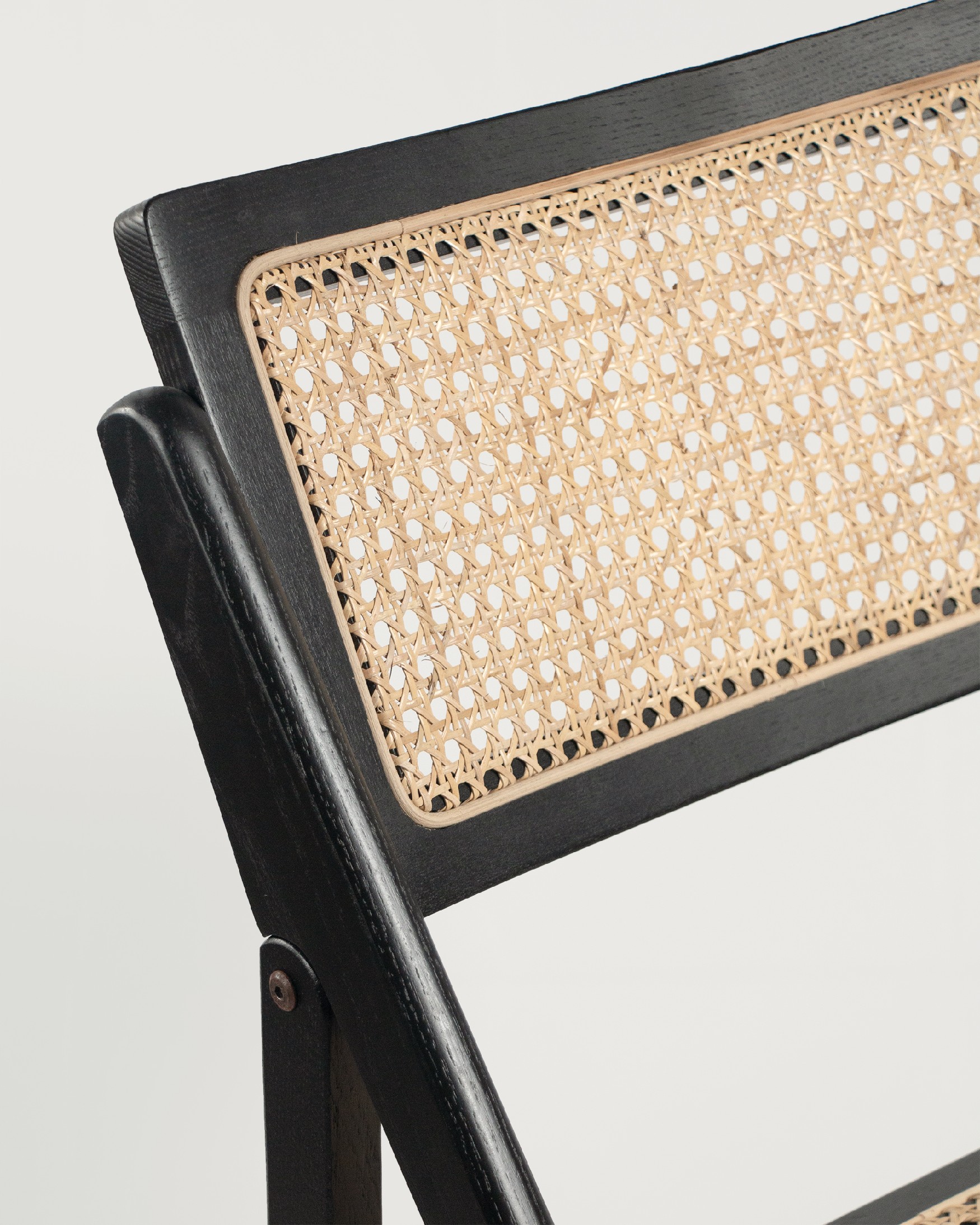 Folding chair Bruna made of rattan and black ash