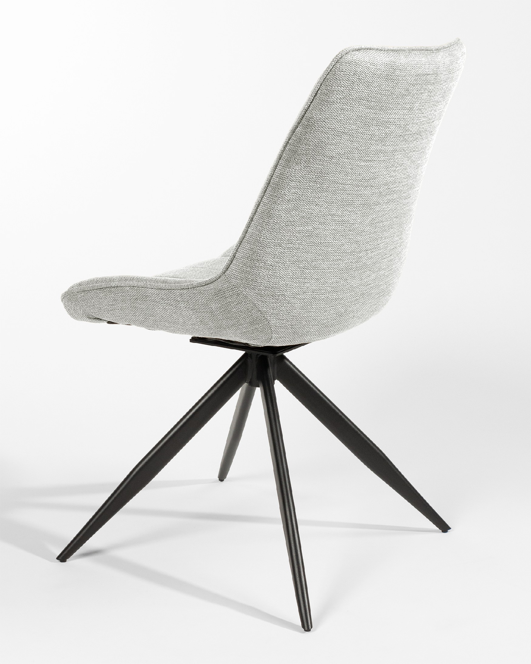 Silla Bursa giratoria 180º con función return, tapizado gris y patas metálicas negras