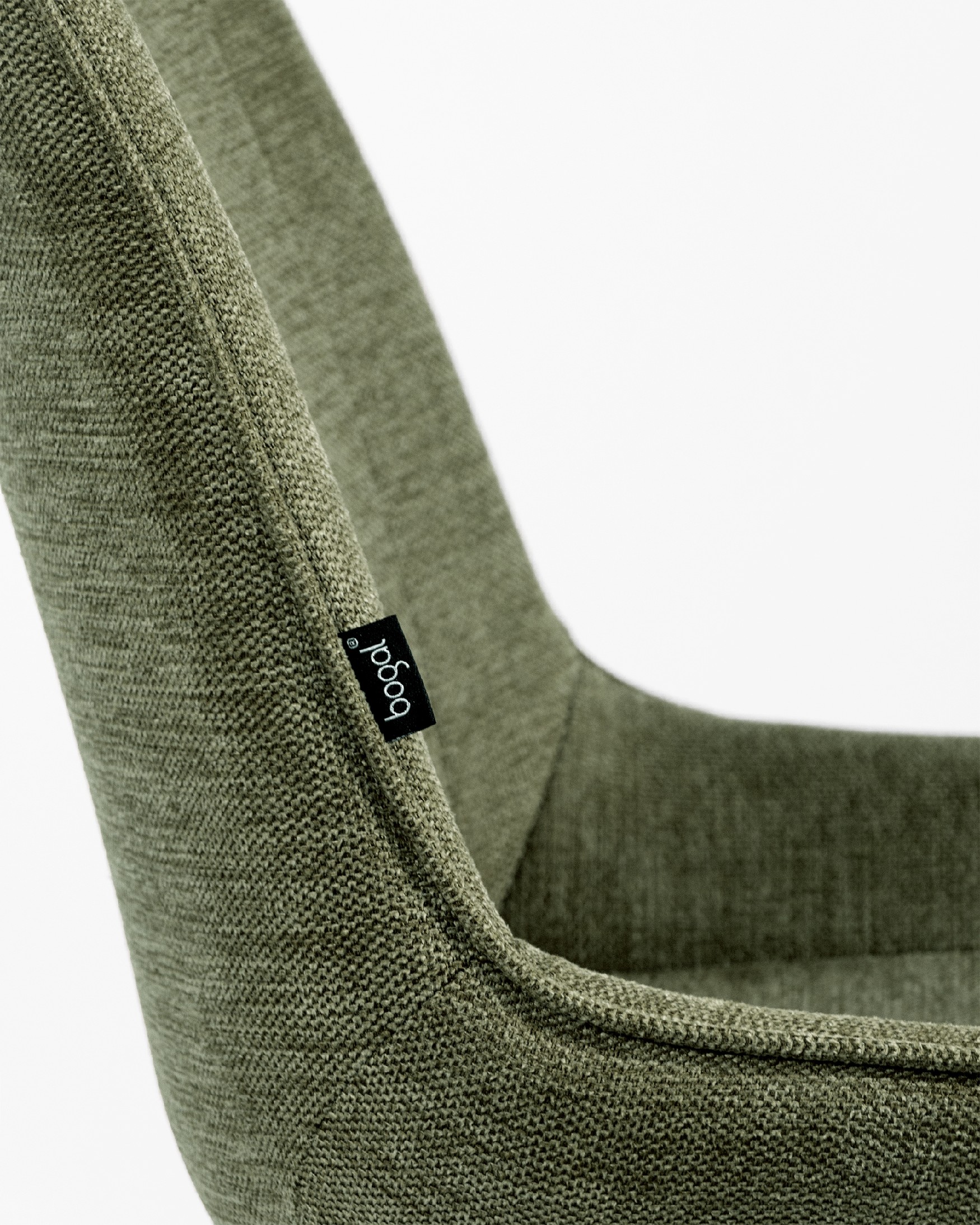 Silla Bursa giratoria 180º con función return, tapizado verde y patas metálicas negras