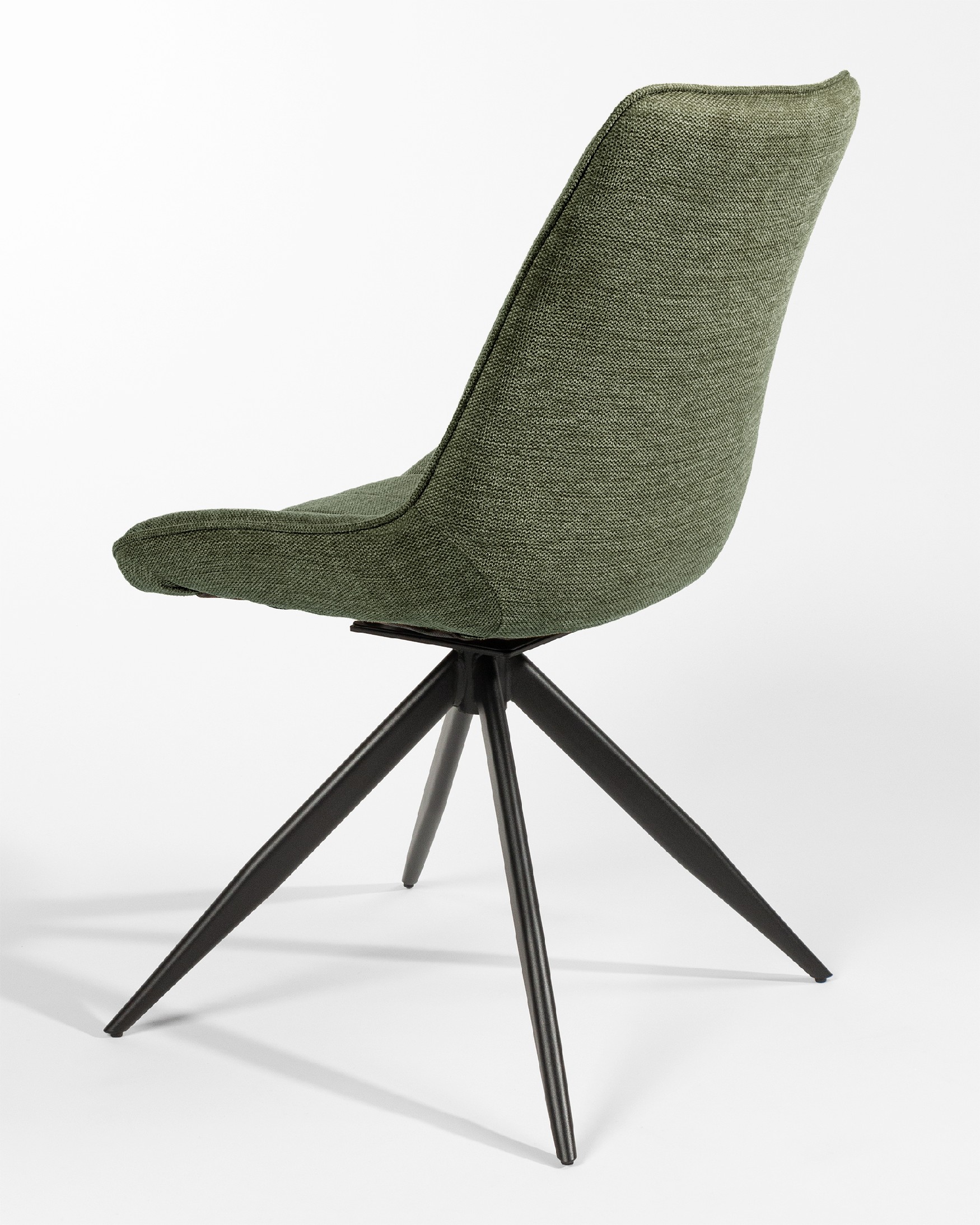Silla Bursa giratoria 180º con función return, tapizado verde y patas metálicas negras