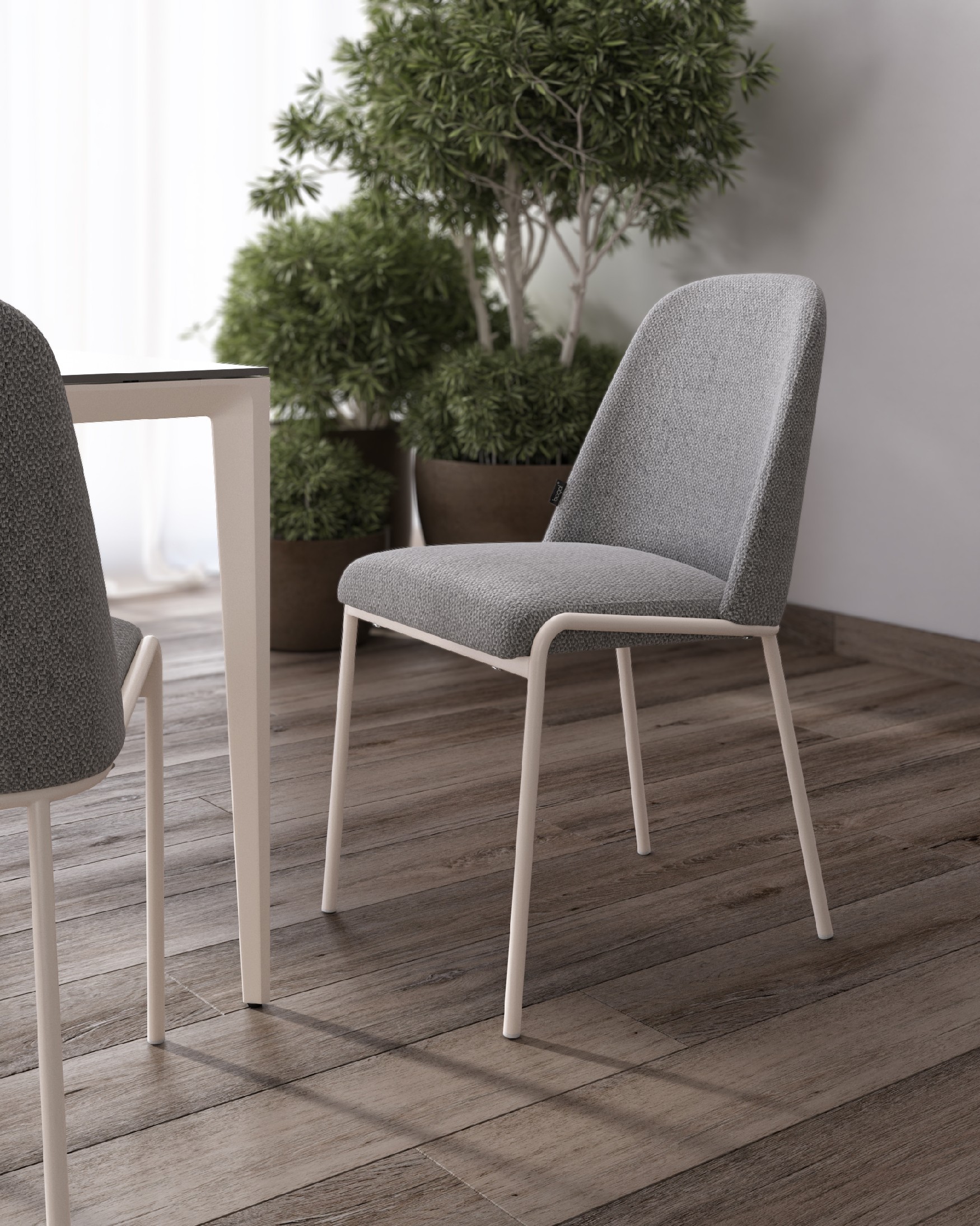 Silla Calgary con tapizado gris y patas metálicas marfil