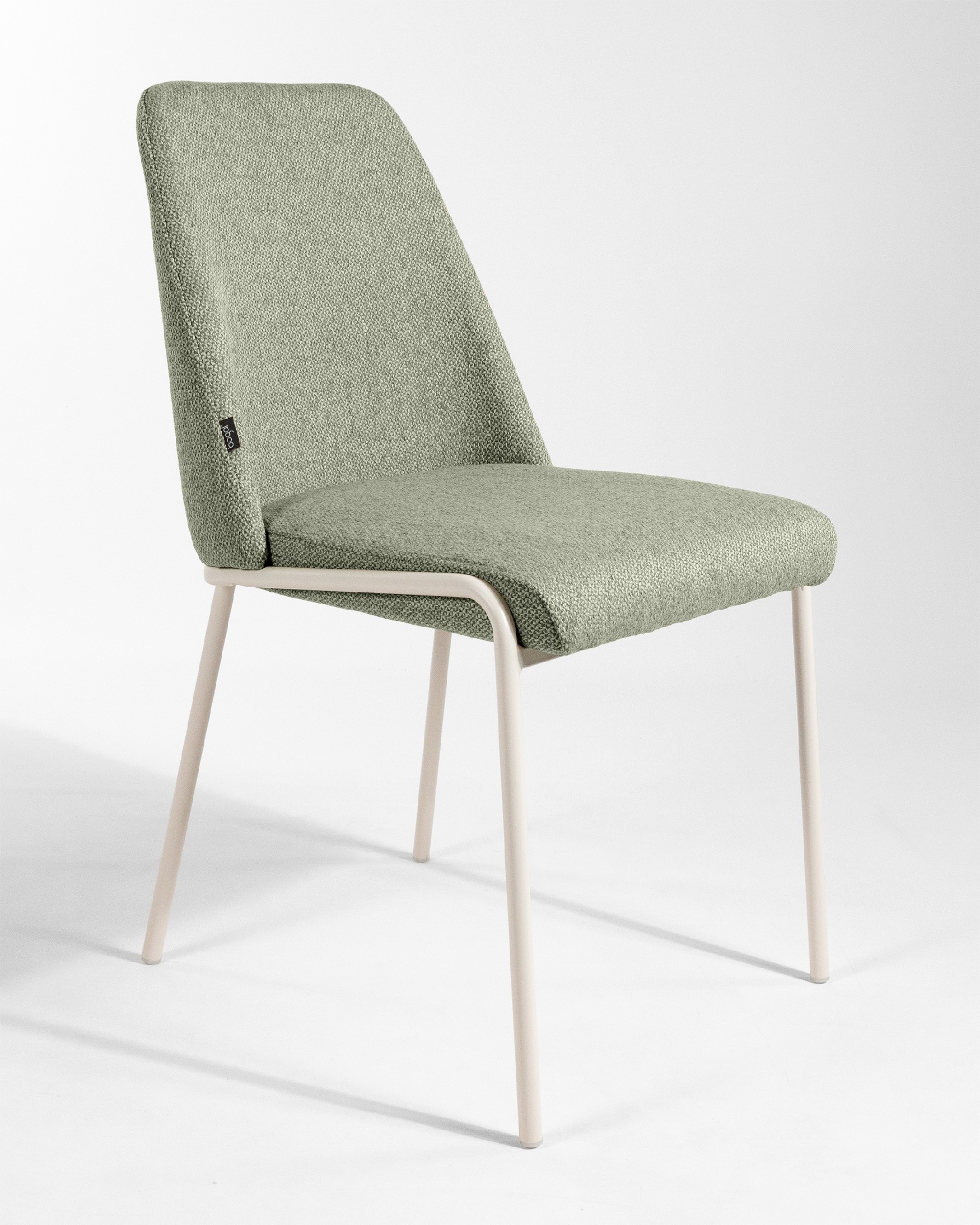 Chaise Calgary avec un revêtement vert et des pieds métalliques ivoire