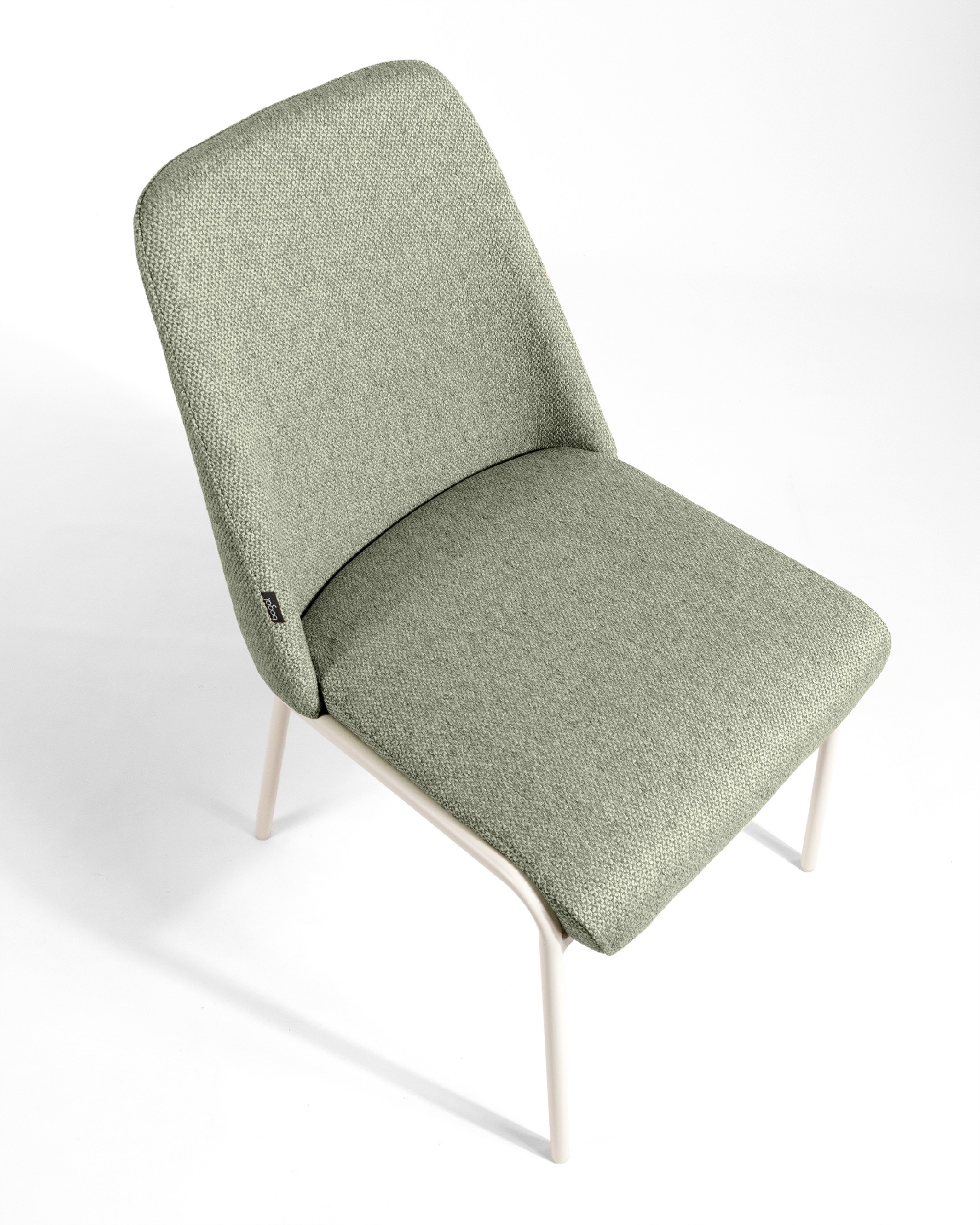 Chaise Calgary avec un revêtement vert et des pieds métalliques ivoire