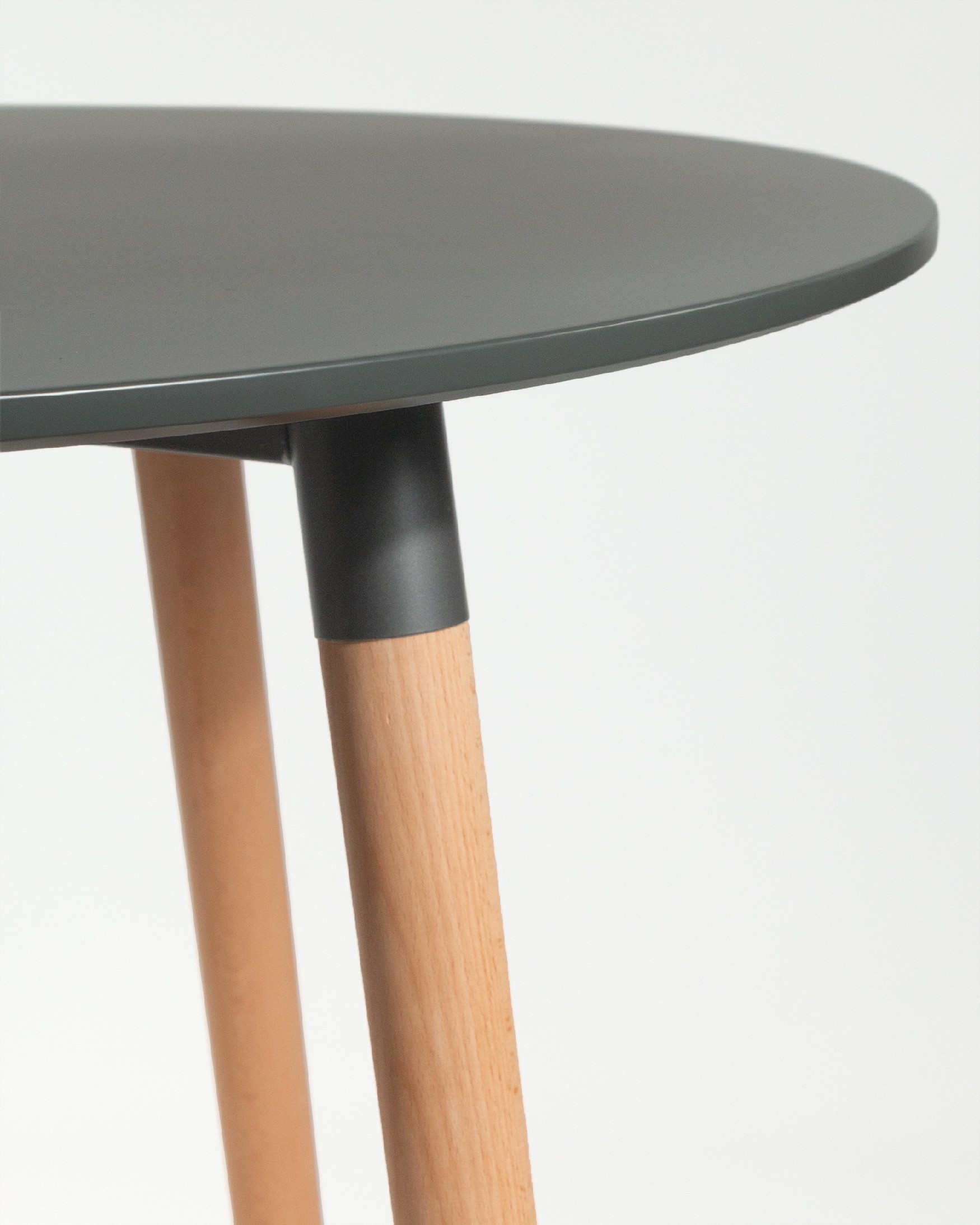 Caribbean round table with a graphite lacquered MDF top and wooden legs Ø 90 cm