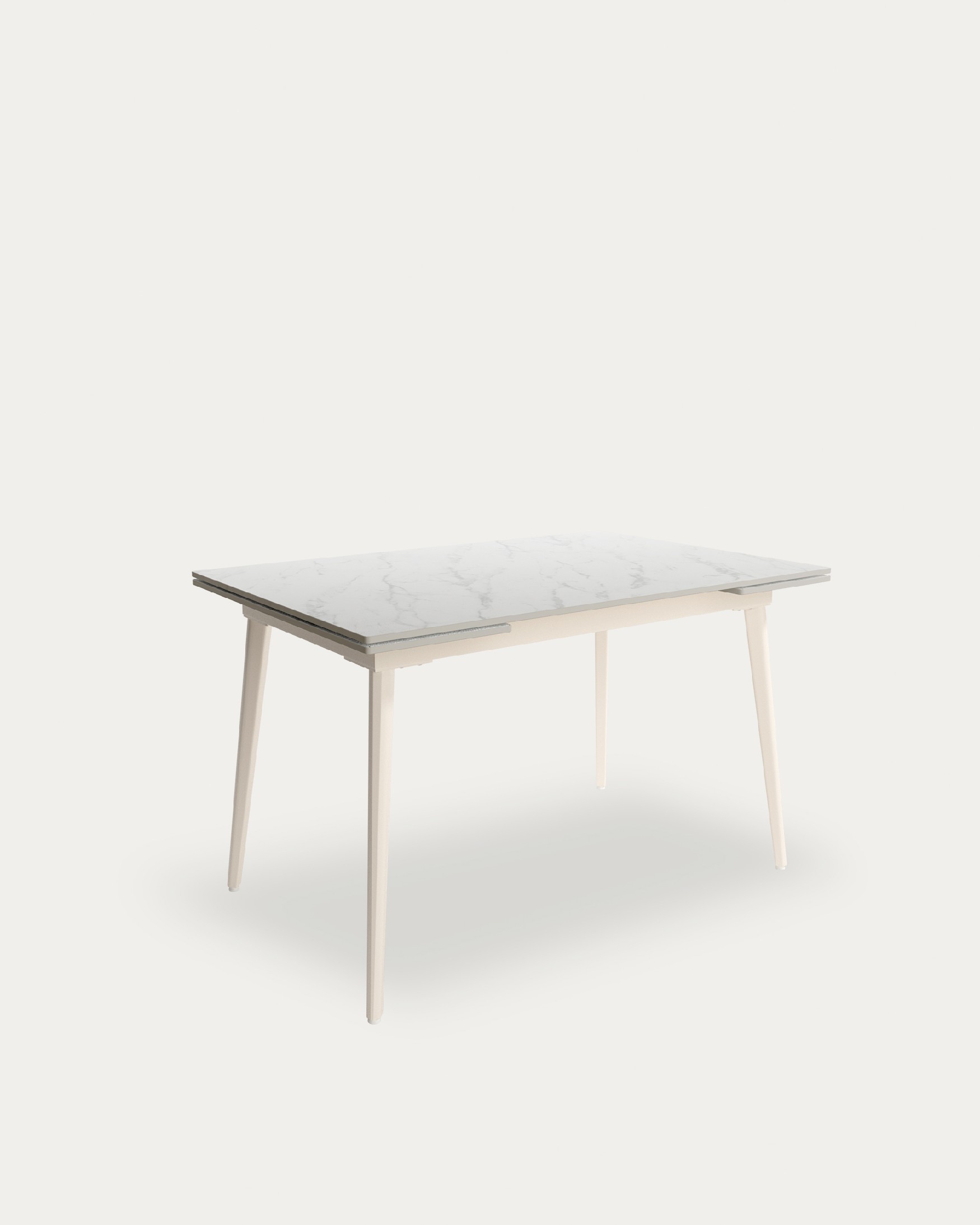 Mesa Celeb extensible con sobre de porcelánico carrara y pata metálica marfil 120(180) x 80 cm