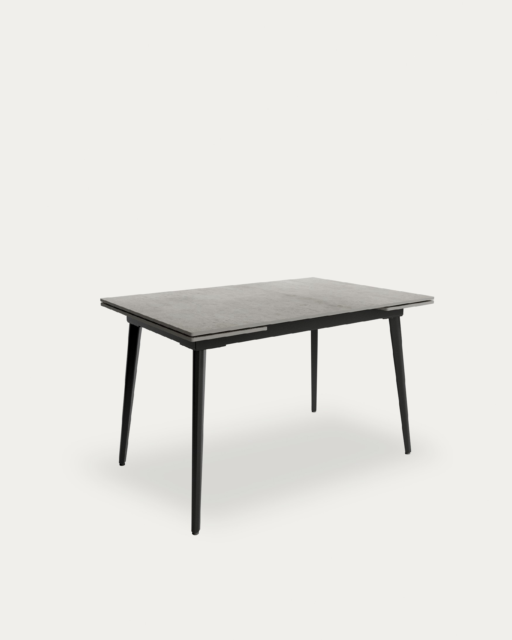 Mesa Celeb extensible con sobre de porcelánico porland y pata metálica negra 120(180) x 80 cm