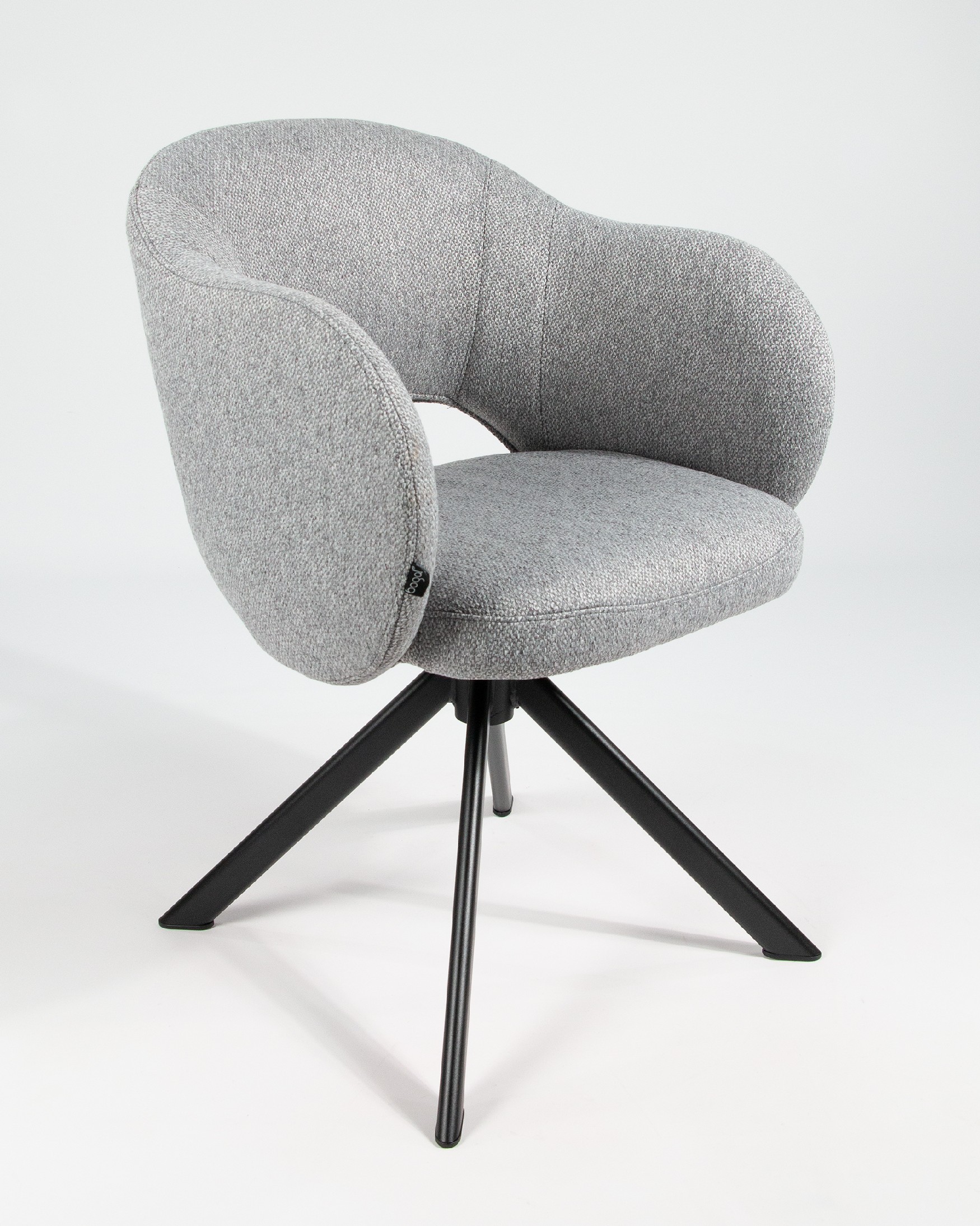 Cork chair with gray upholstery and black metal legs