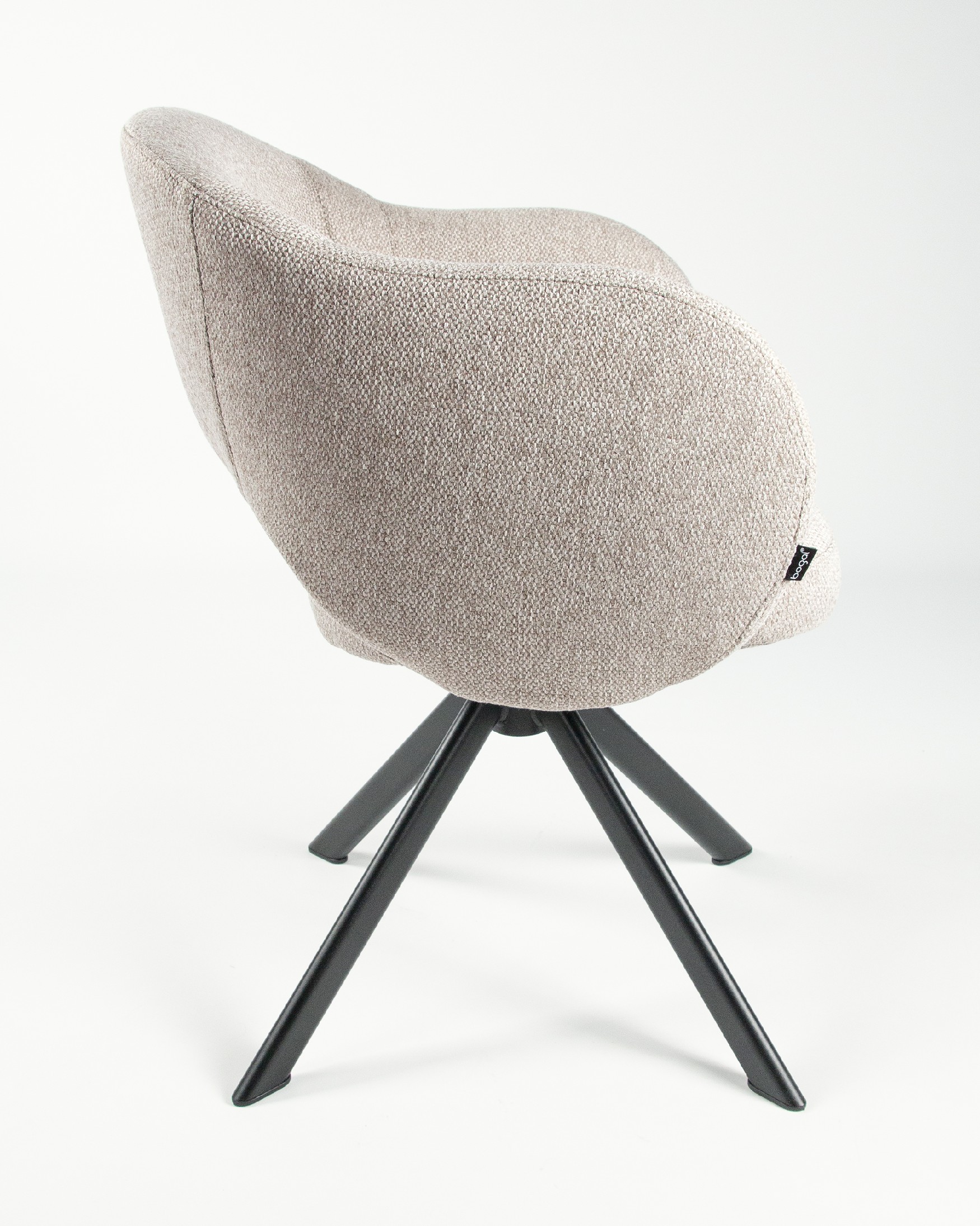 Cork chair with brown upholstery and black metal legs
