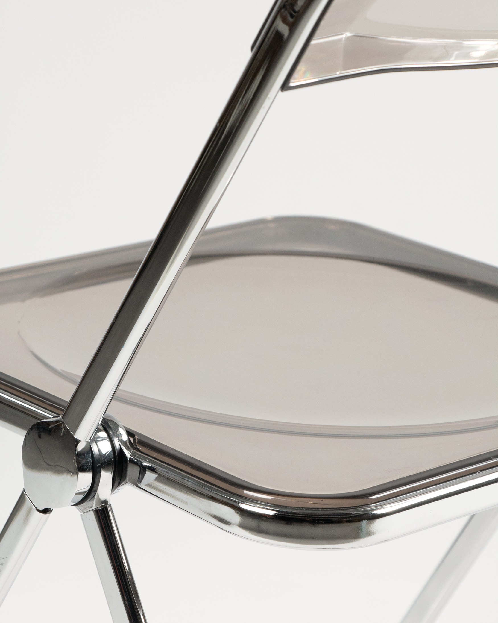 Cuzco folding chair made of metal and smoke resin