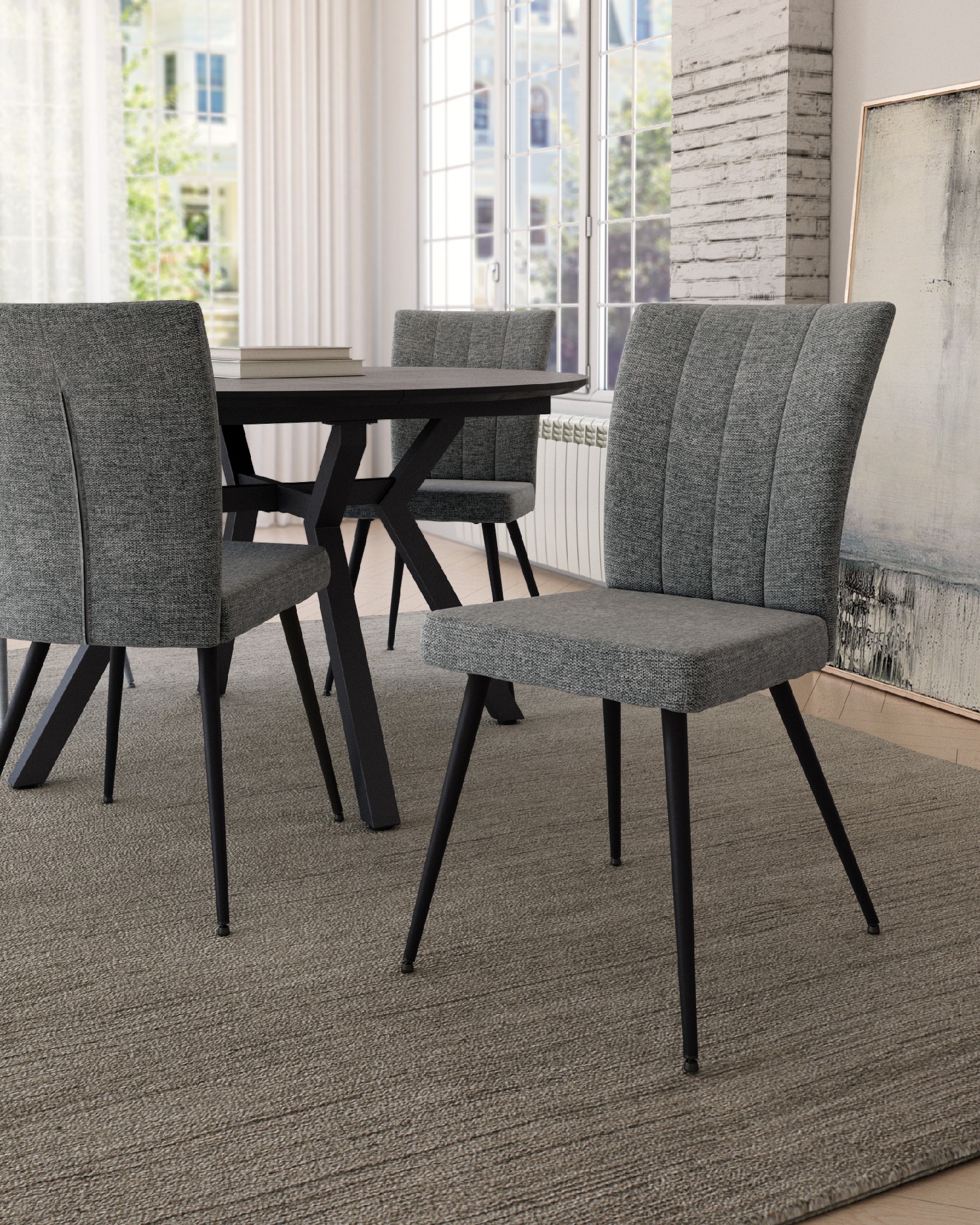 Silla Dallas con tapizado gris y patas metálicas negras
