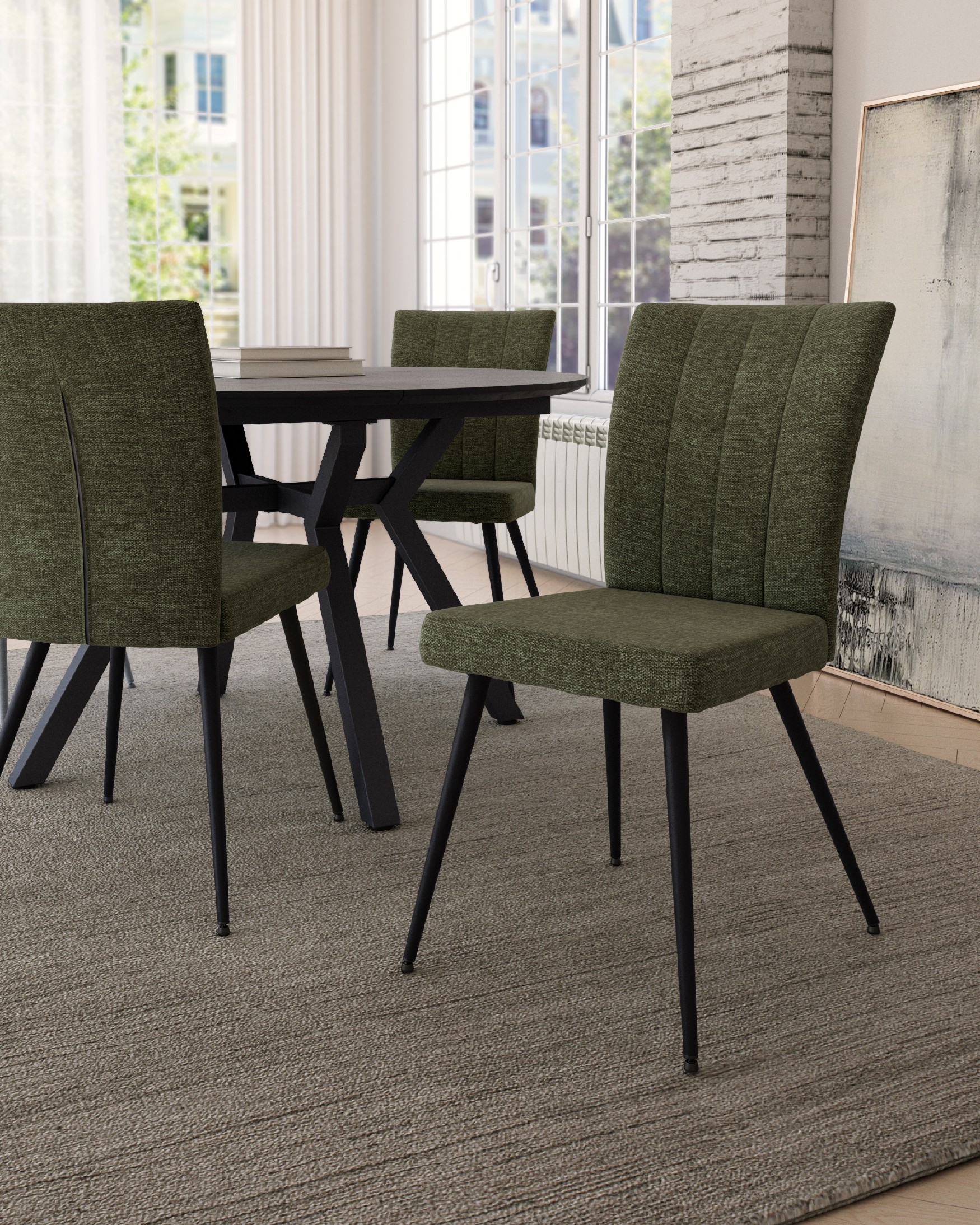 Dallas chair with green upholstery and black metal legs