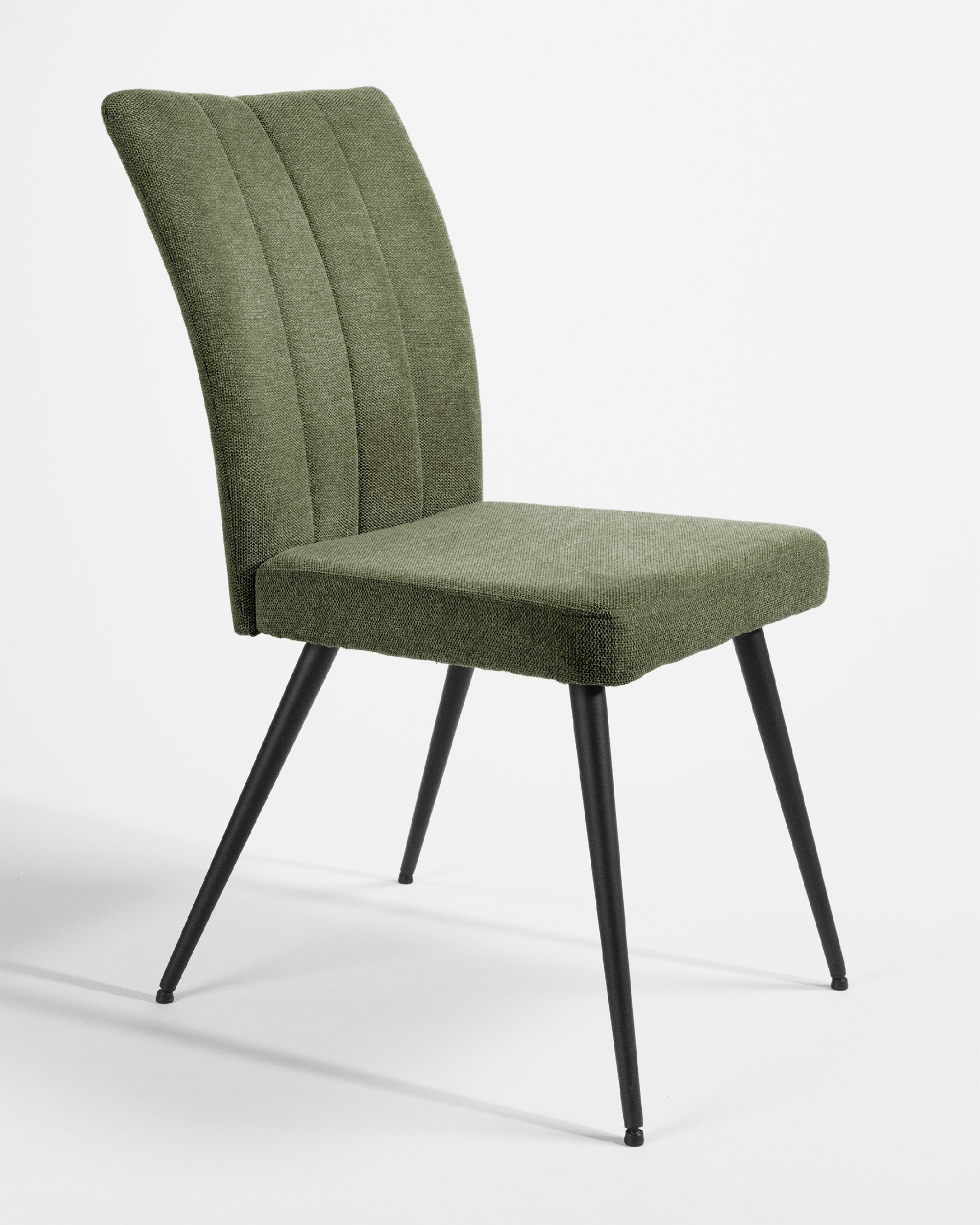 Dallas chair with green upholstery and black metal legs