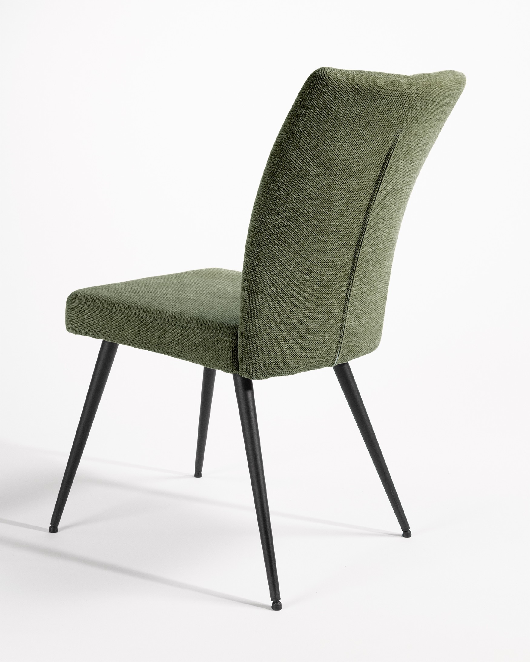 Dallas chair with green upholstery and black metal legs