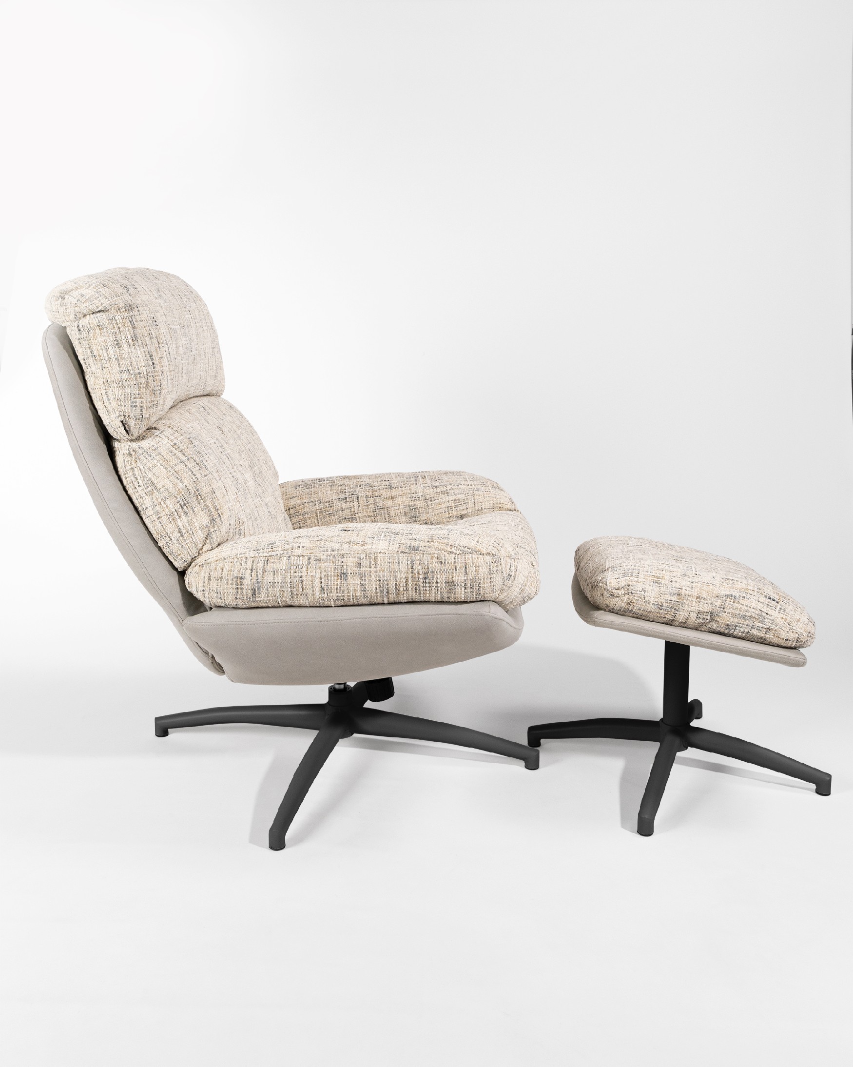 Denia armchair with pearl and cloud upholstery and black metal structure ottoman, 360° swivel rocking.