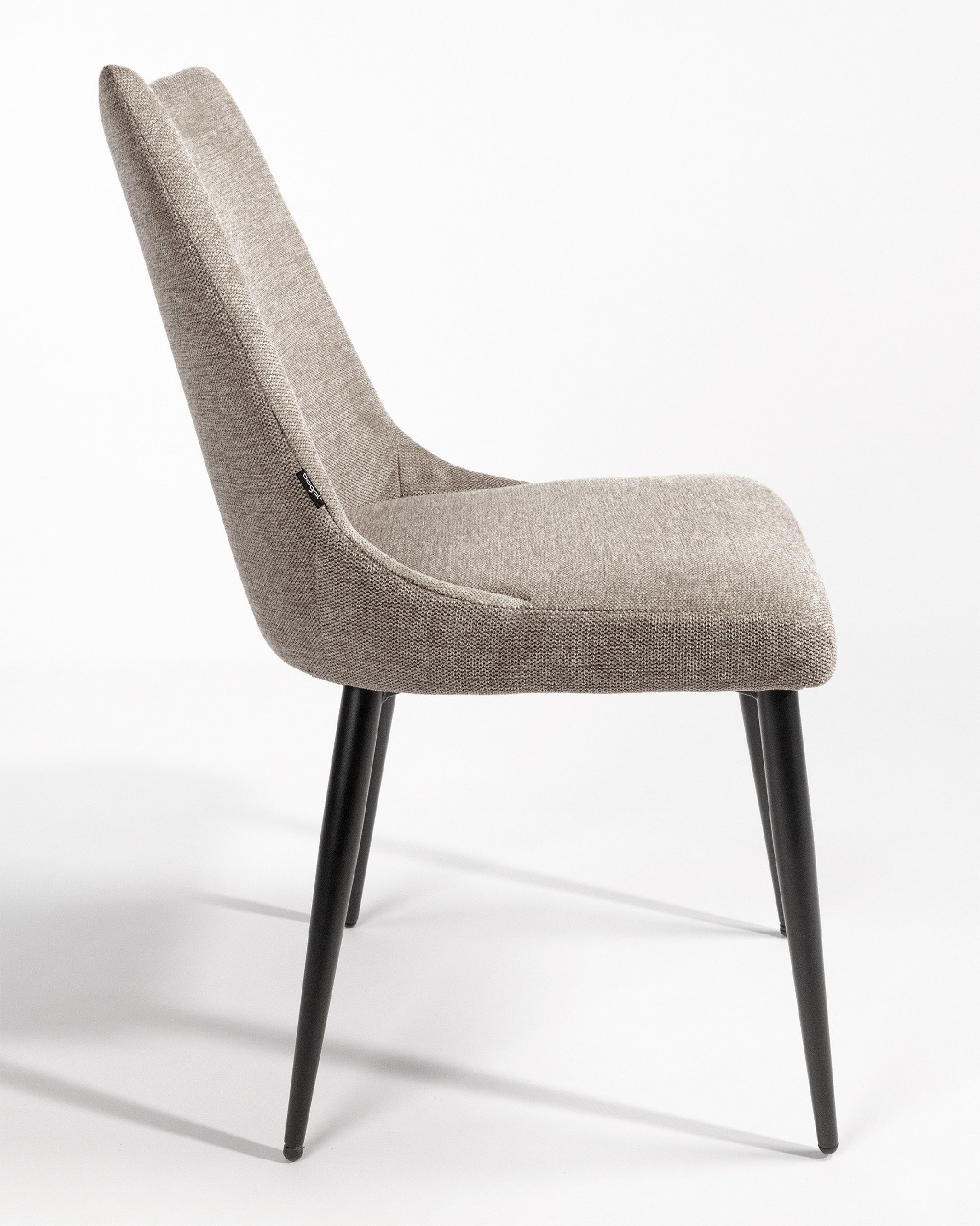 Denver chair with brown upholstery and black metal legs