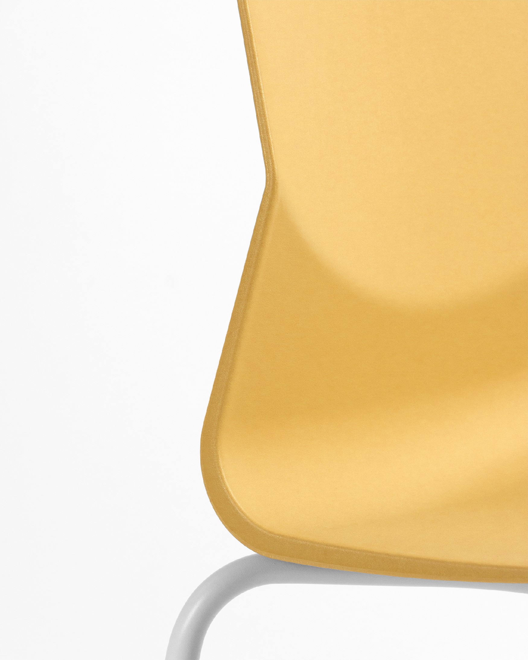 mustard polypropylene Derby chair with white metal legs