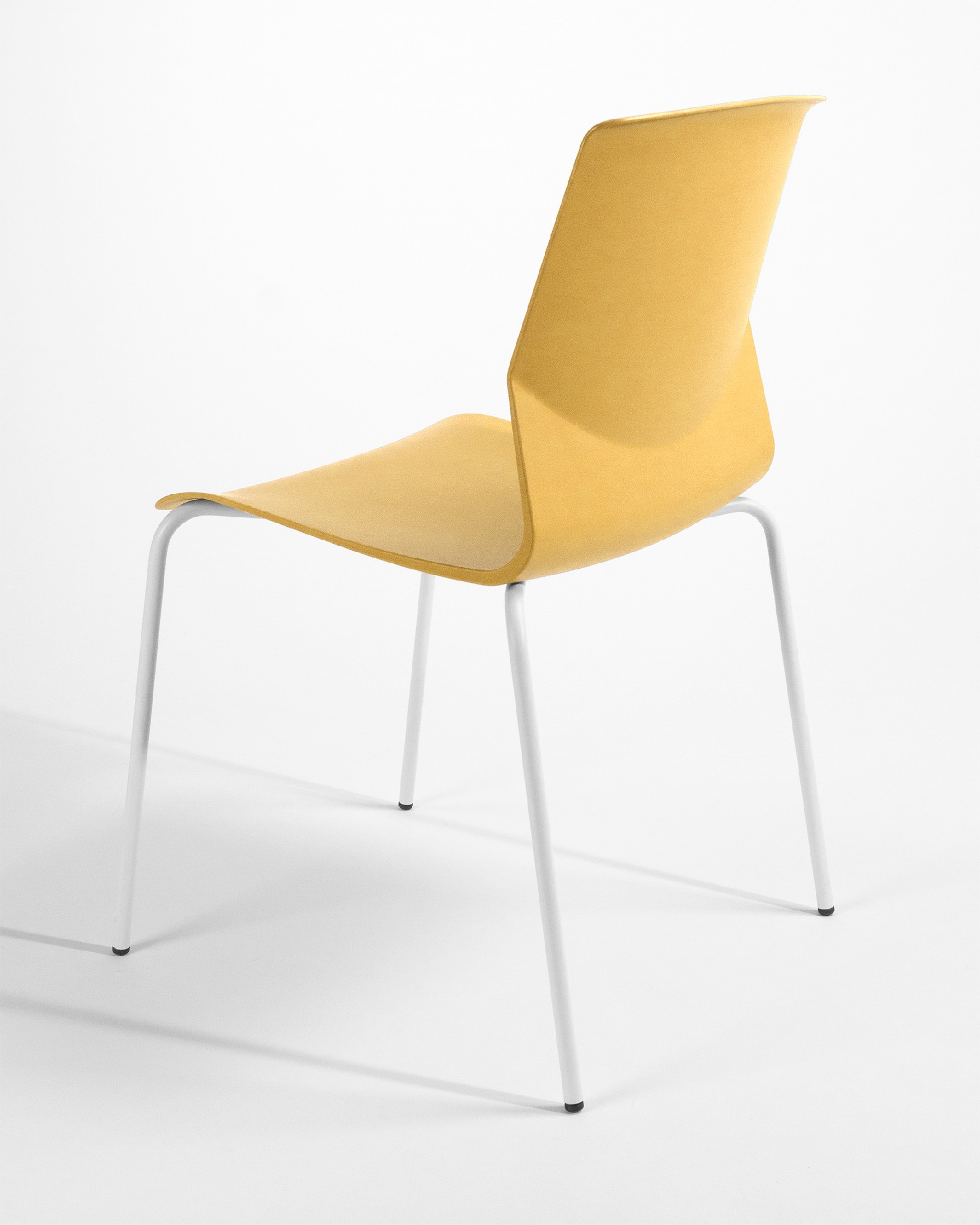 mustard polypropylene Derby chair with white metal legs