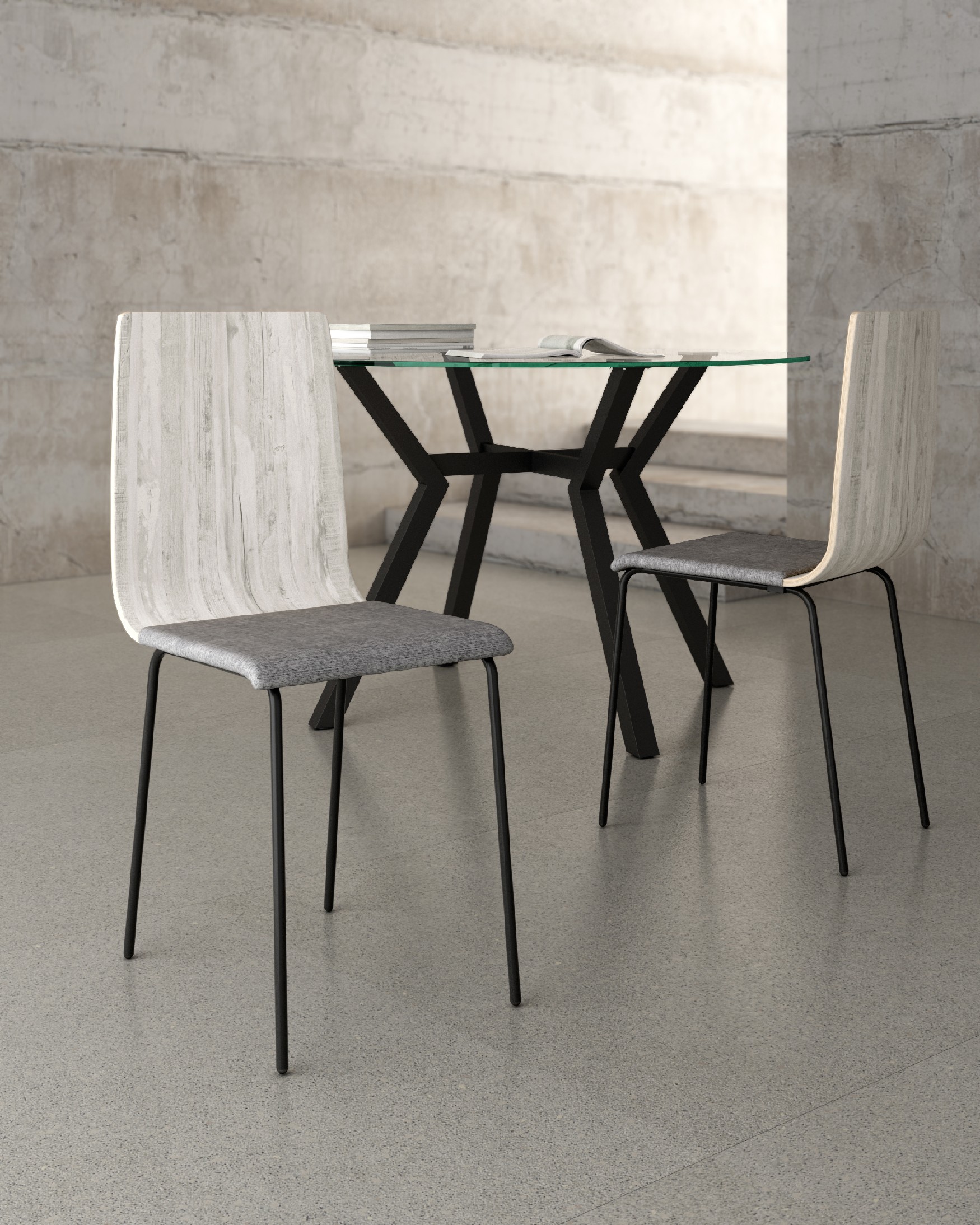 Dubai chair with gray upholstery, articulated backrest, and black metal legs