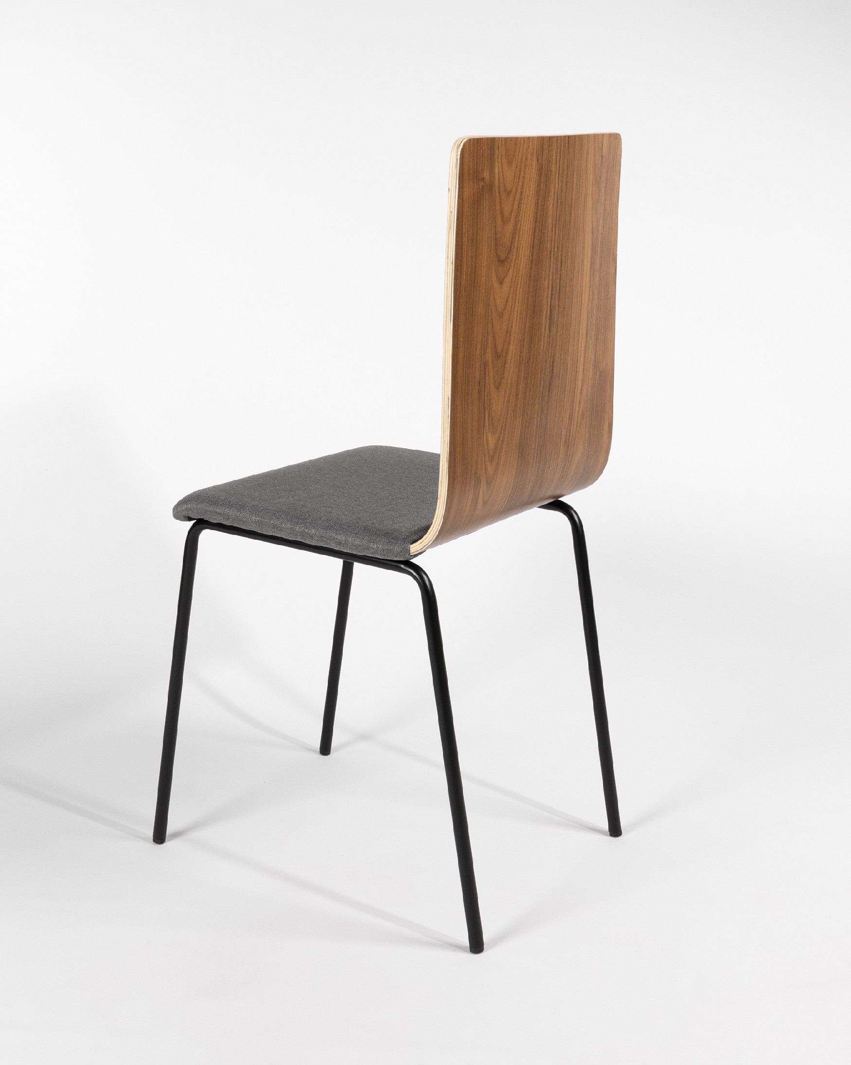 Dubai chair with gray upholstery, java backrest, and black metal legs