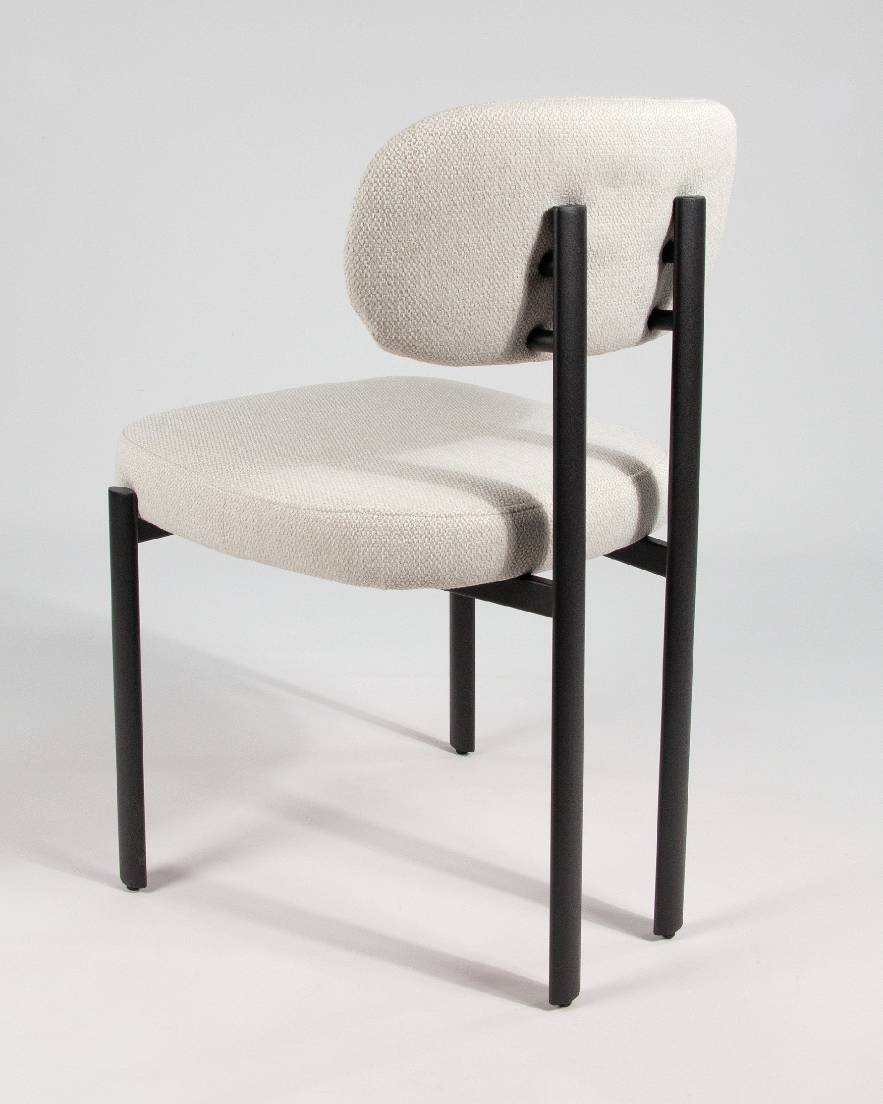 Durban chair with mother-of-pearl upholstery and black metal legs