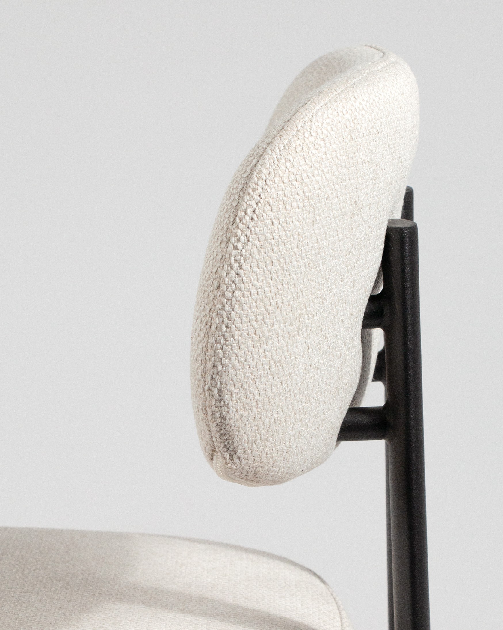Durban chair with mother-of-pearl upholstery and black metal legs