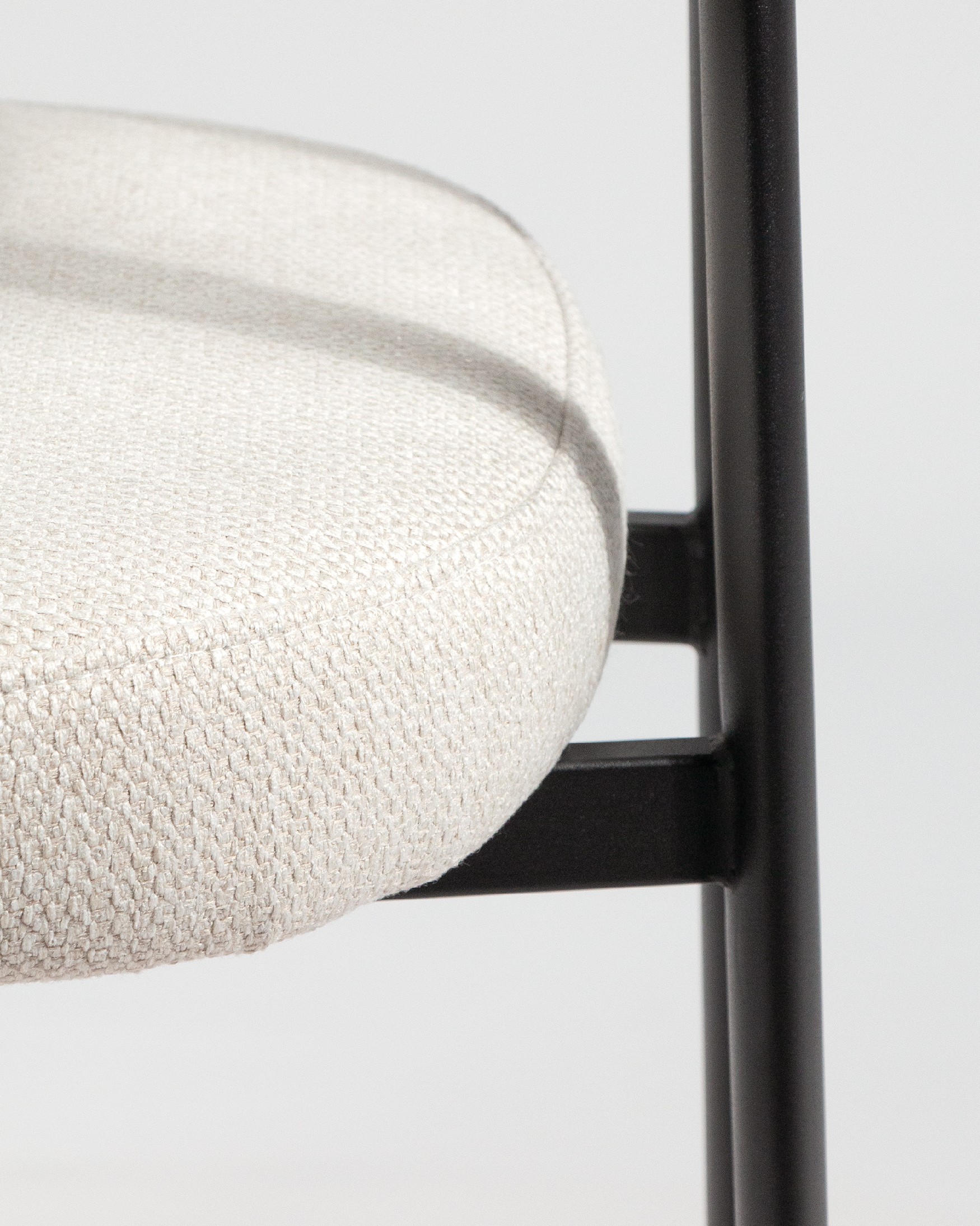 Durban chair with mother-of-pearl upholstery and black metal legs
