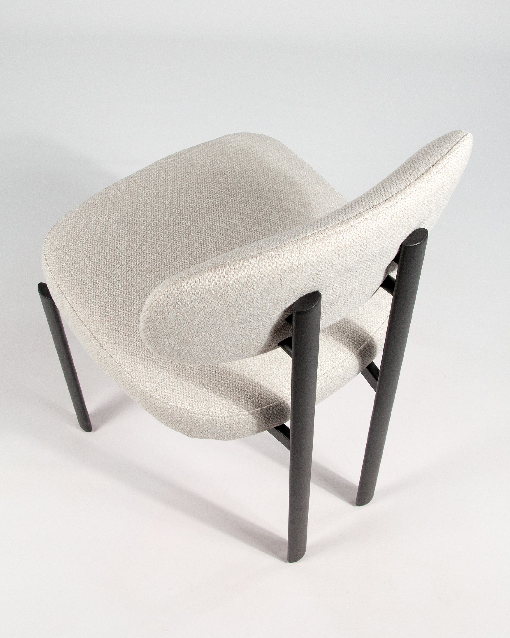 Durban chair with mother-of-pearl upholstery and black metal legs