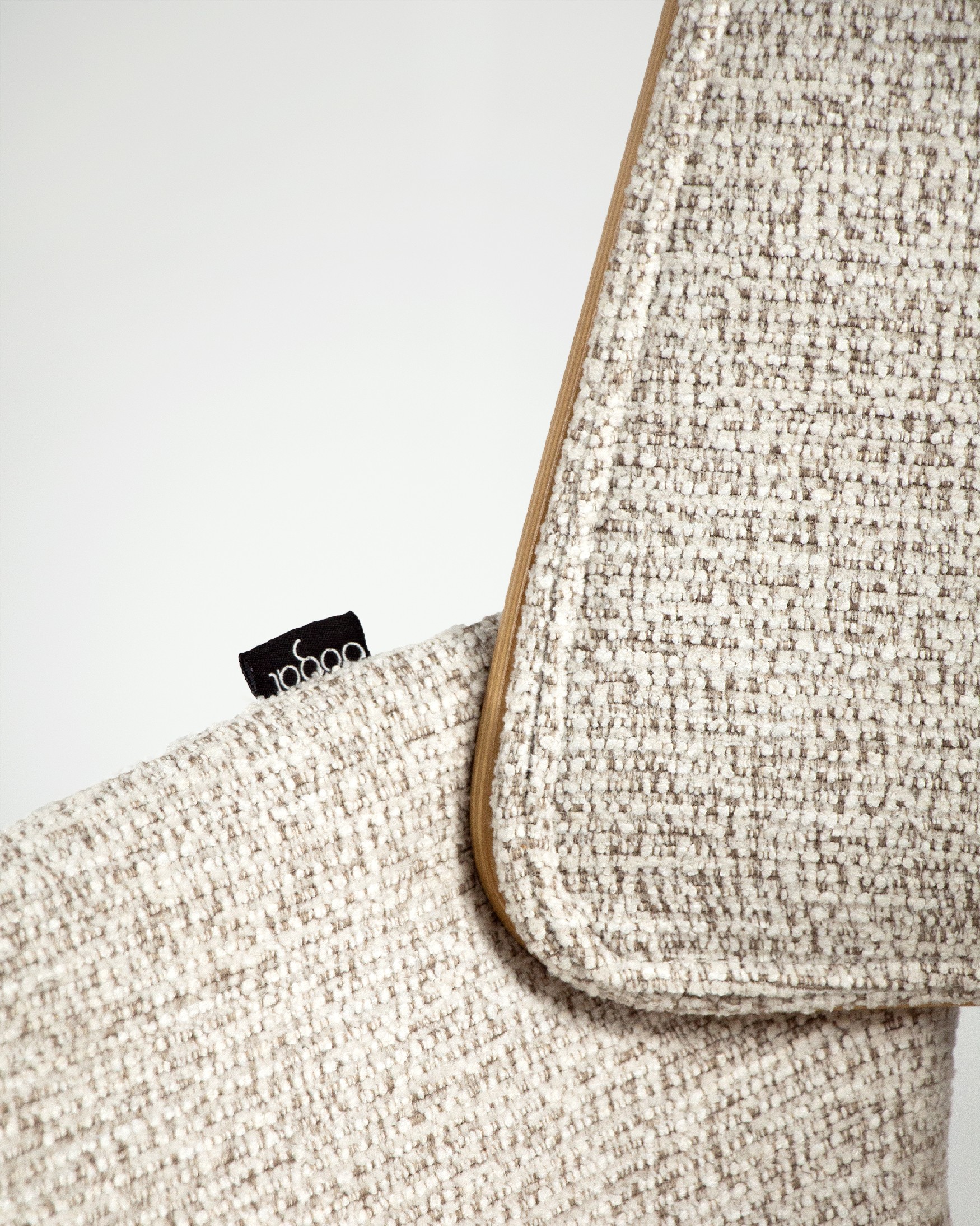 Eva chair upholstered with mother-of-pearl and natural oak frame