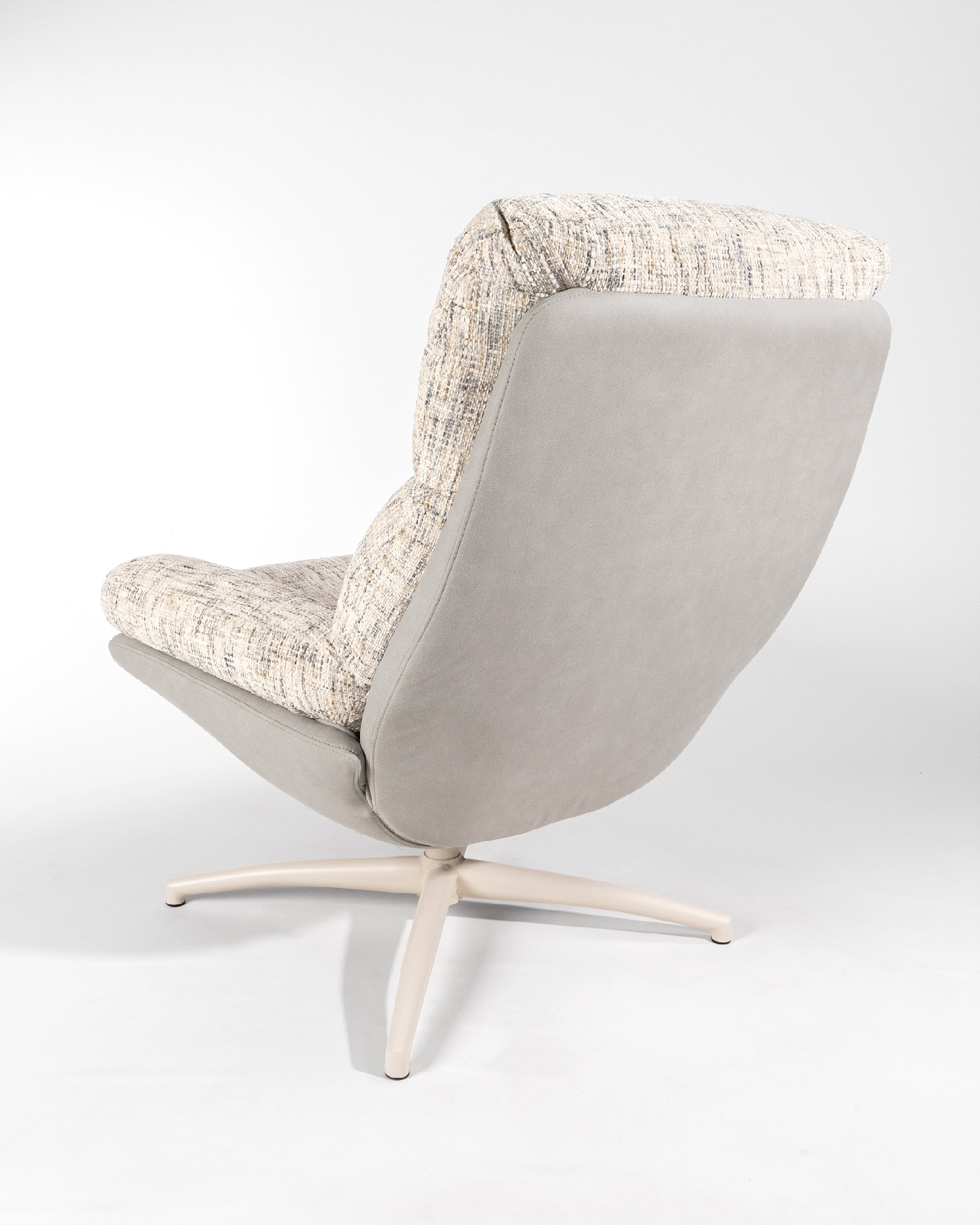 Fresia armchair with pearl and cloud upholstery and ivory metal structure ottoman, 360° rotating tilting.