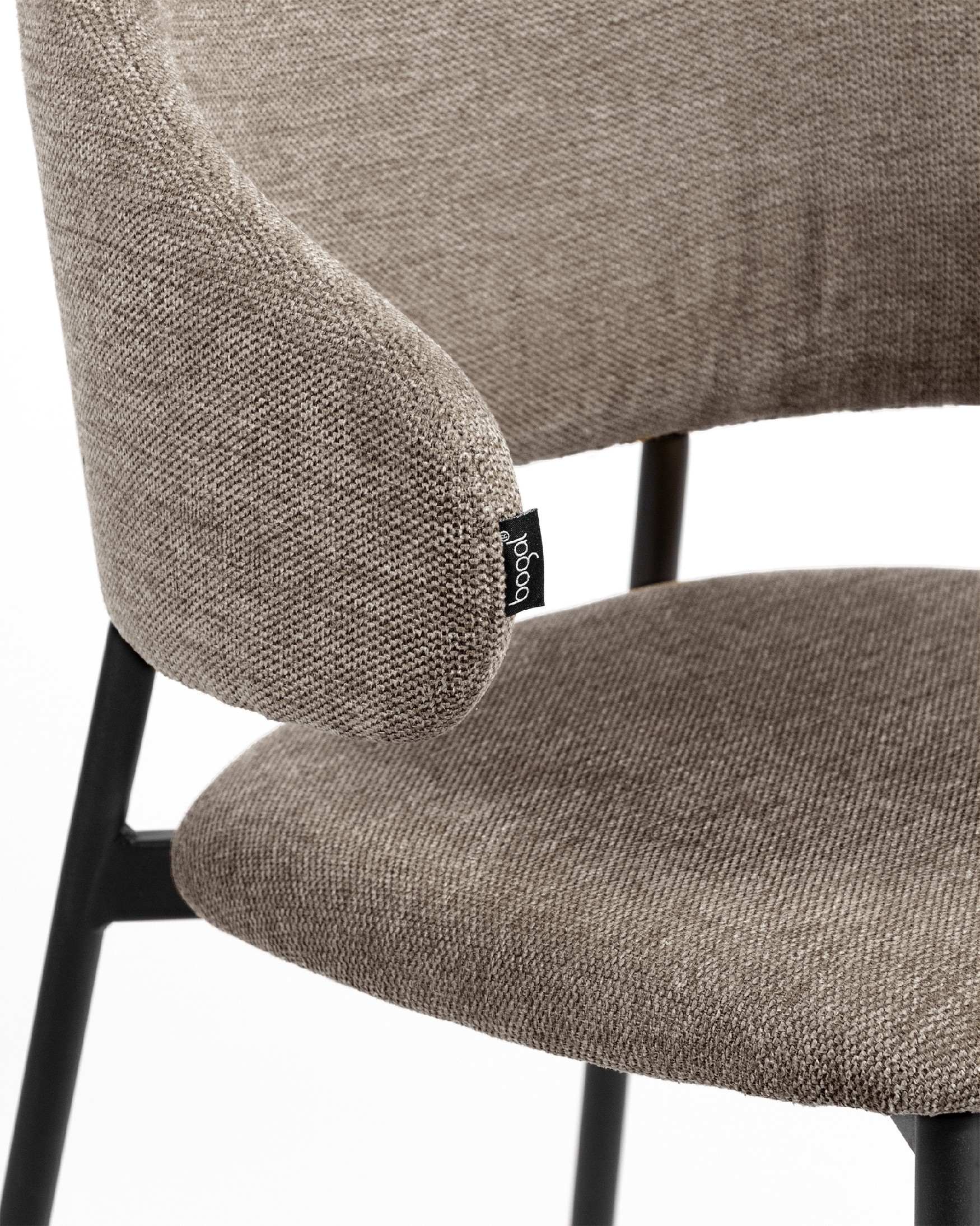 Gante chair with brown upholstery and black metal legs