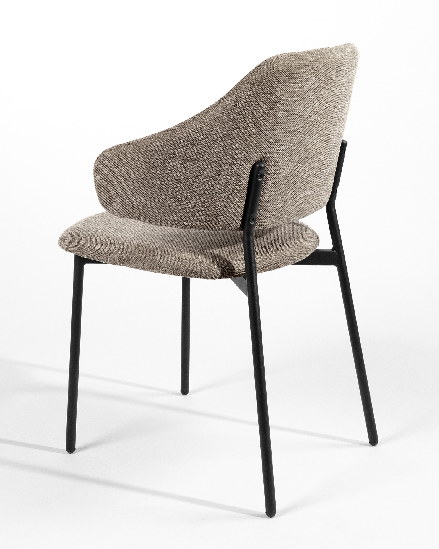 Gante chair with brown upholstery and black metal legs