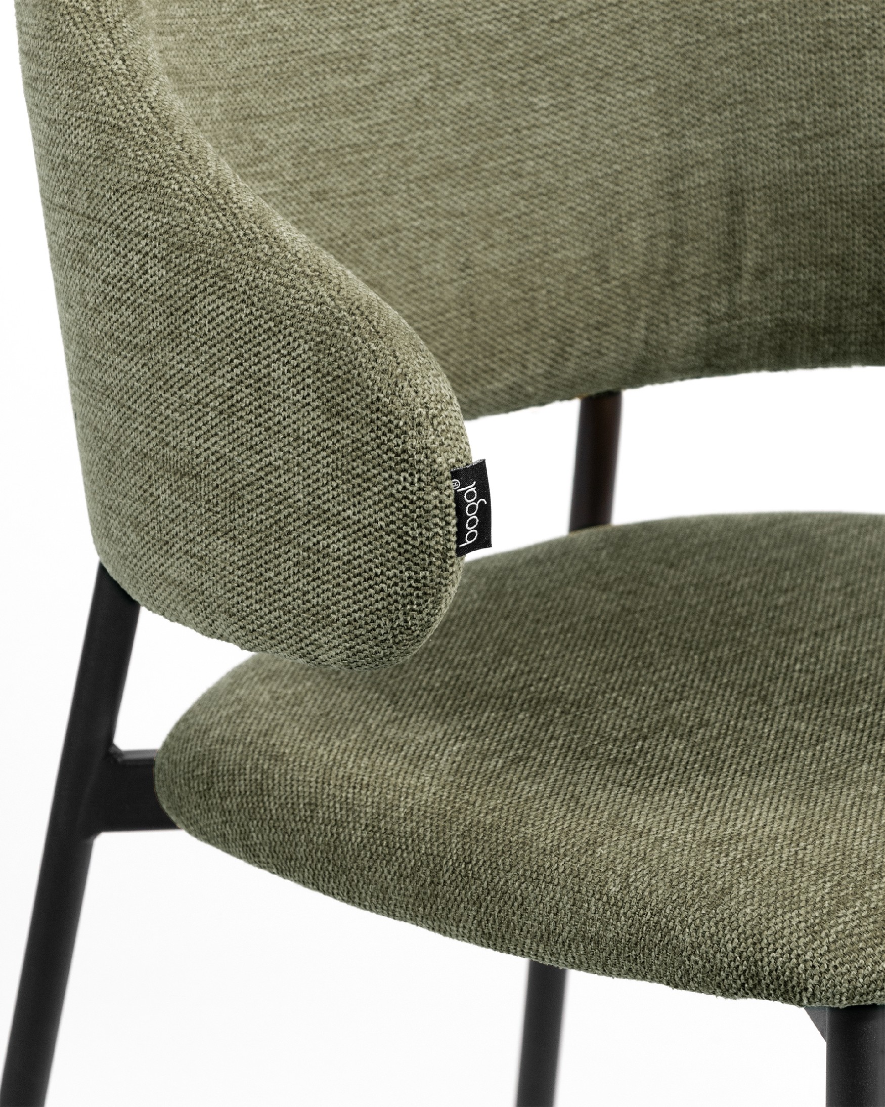 Gante chair with green upholstery and black metal legs