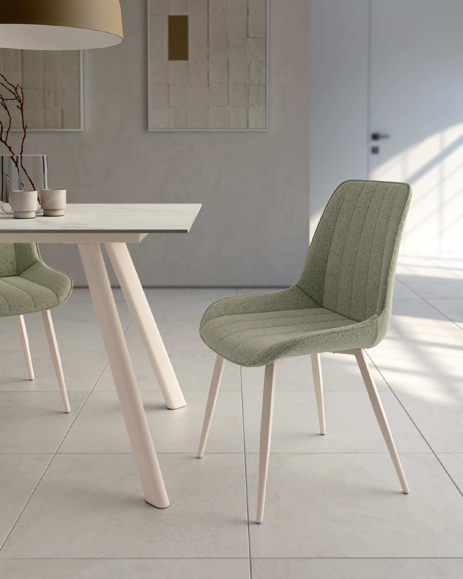 Chaise Helsinki avec un revêtement vert et des pieds métalliques ivoire