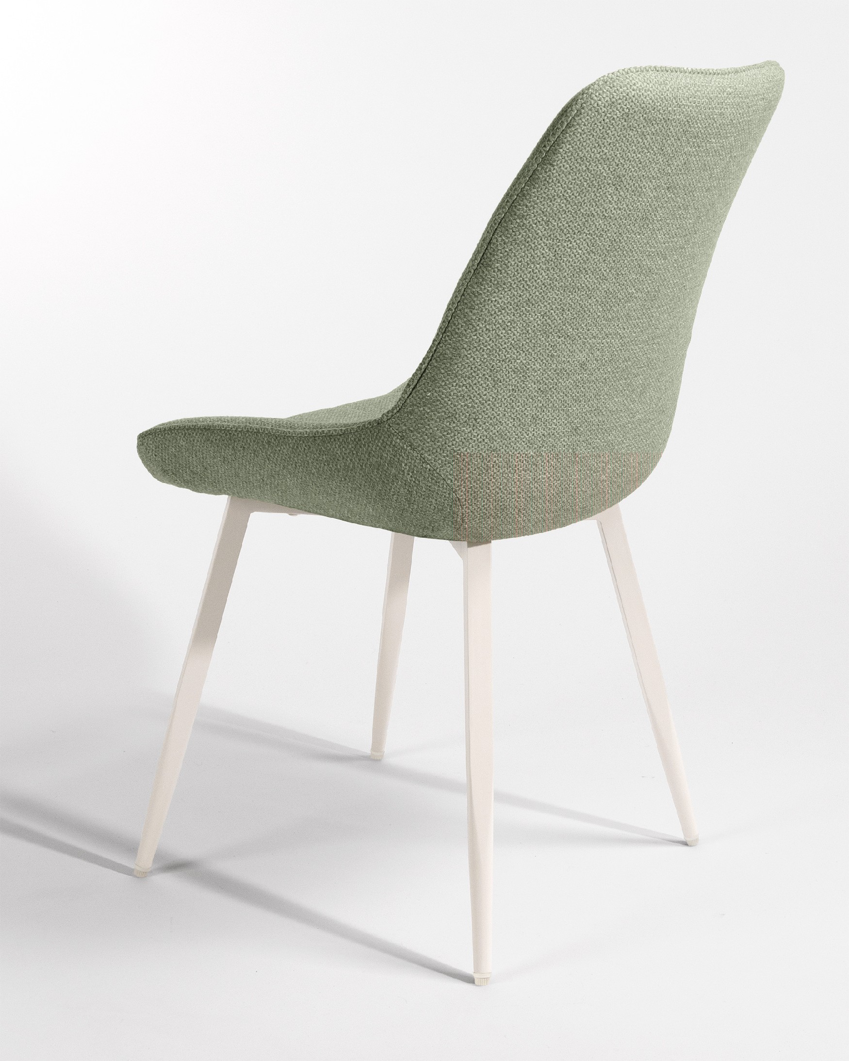 Chaise Helsinki avec un revêtement vert et des pieds métalliques ivoire