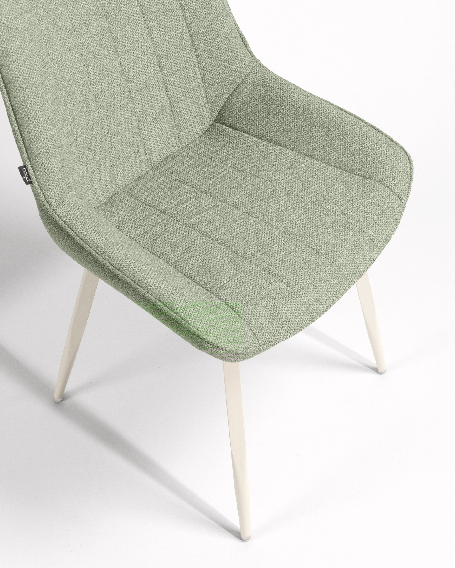 Chaise Helsinki avec un revêtement vert et des pieds métalliques ivoire