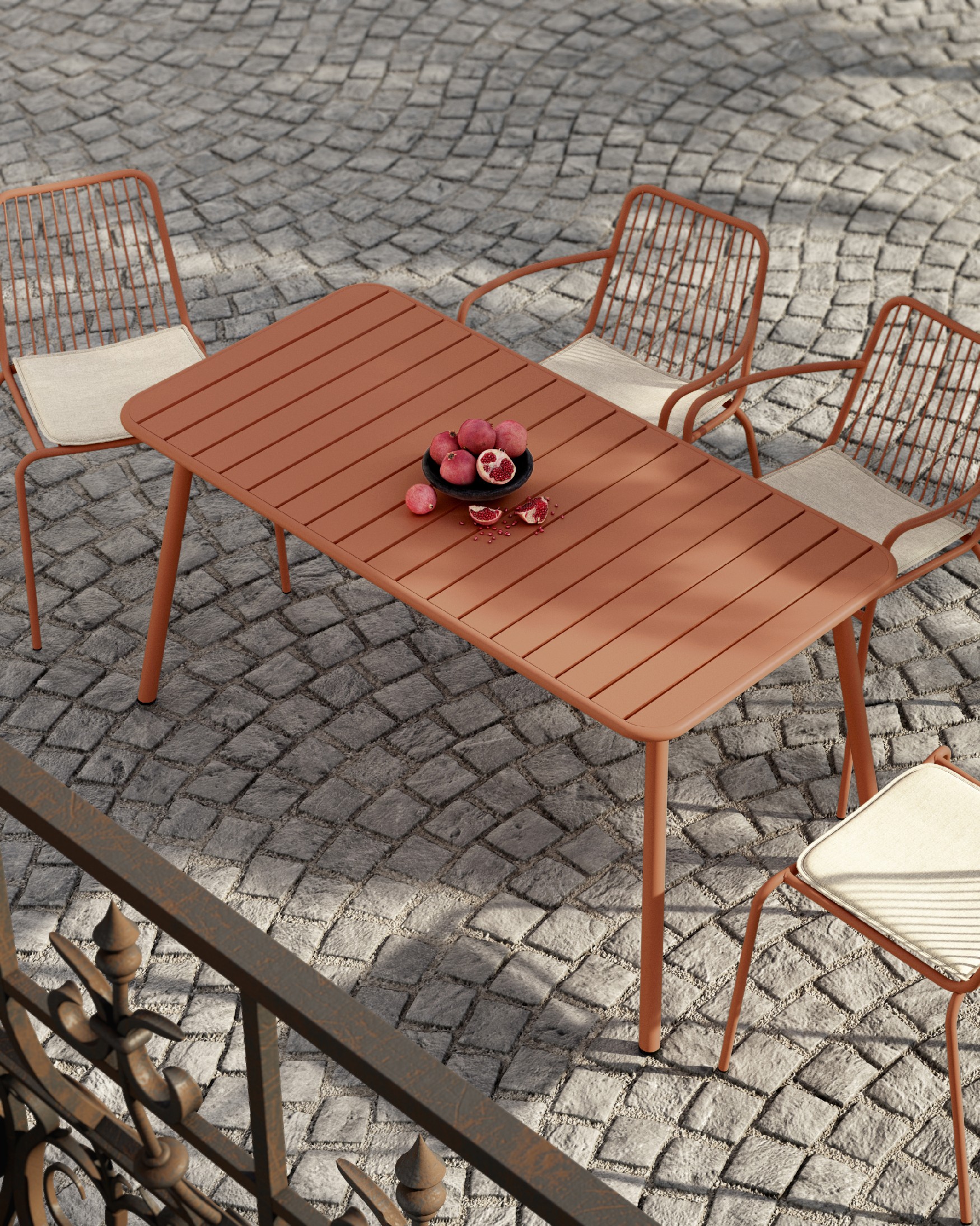 Honolulu outdoor metal table in terracotta color 140 x 70 cm